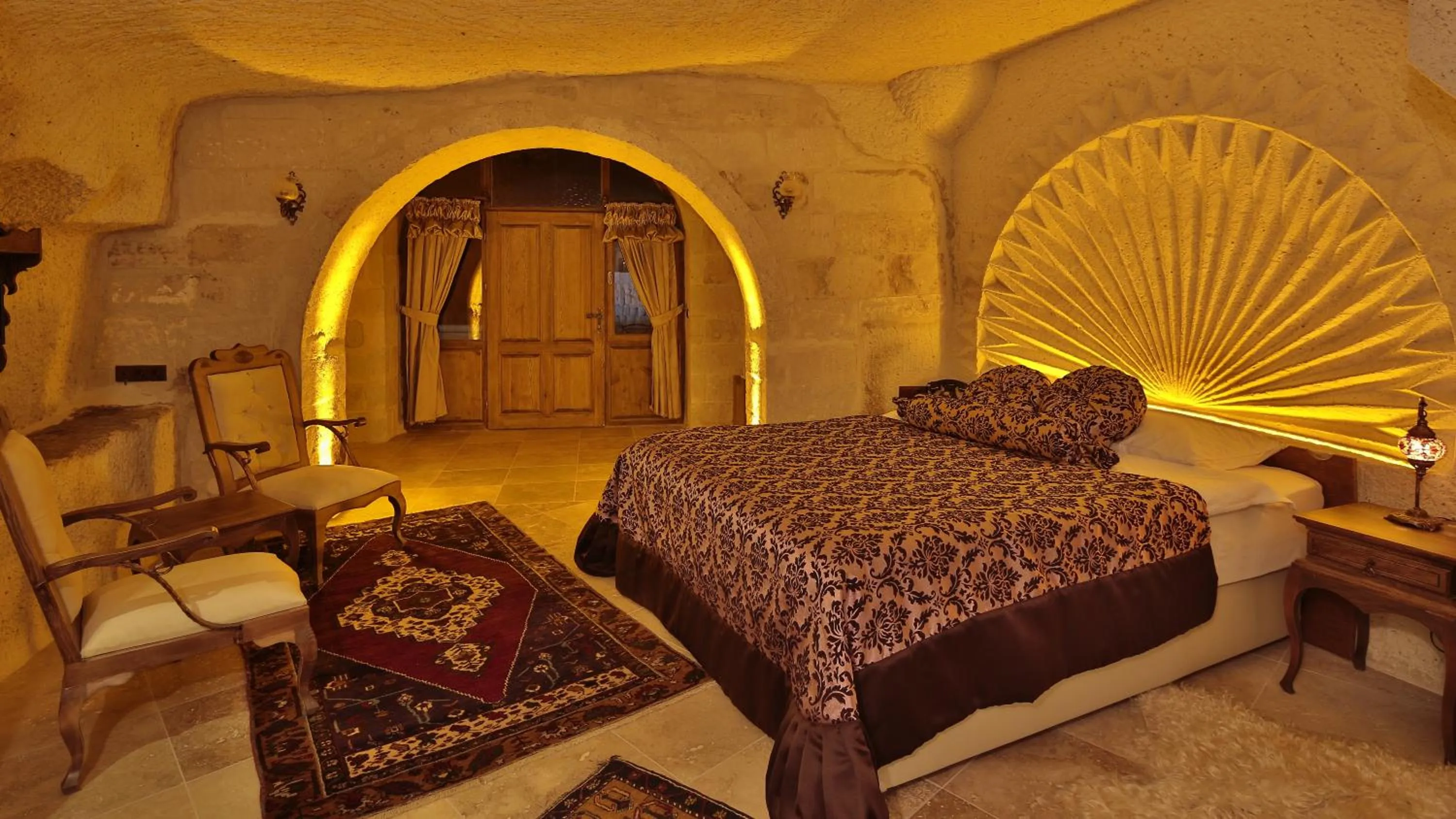 Toilet, Bed in Phocas Cave Suites