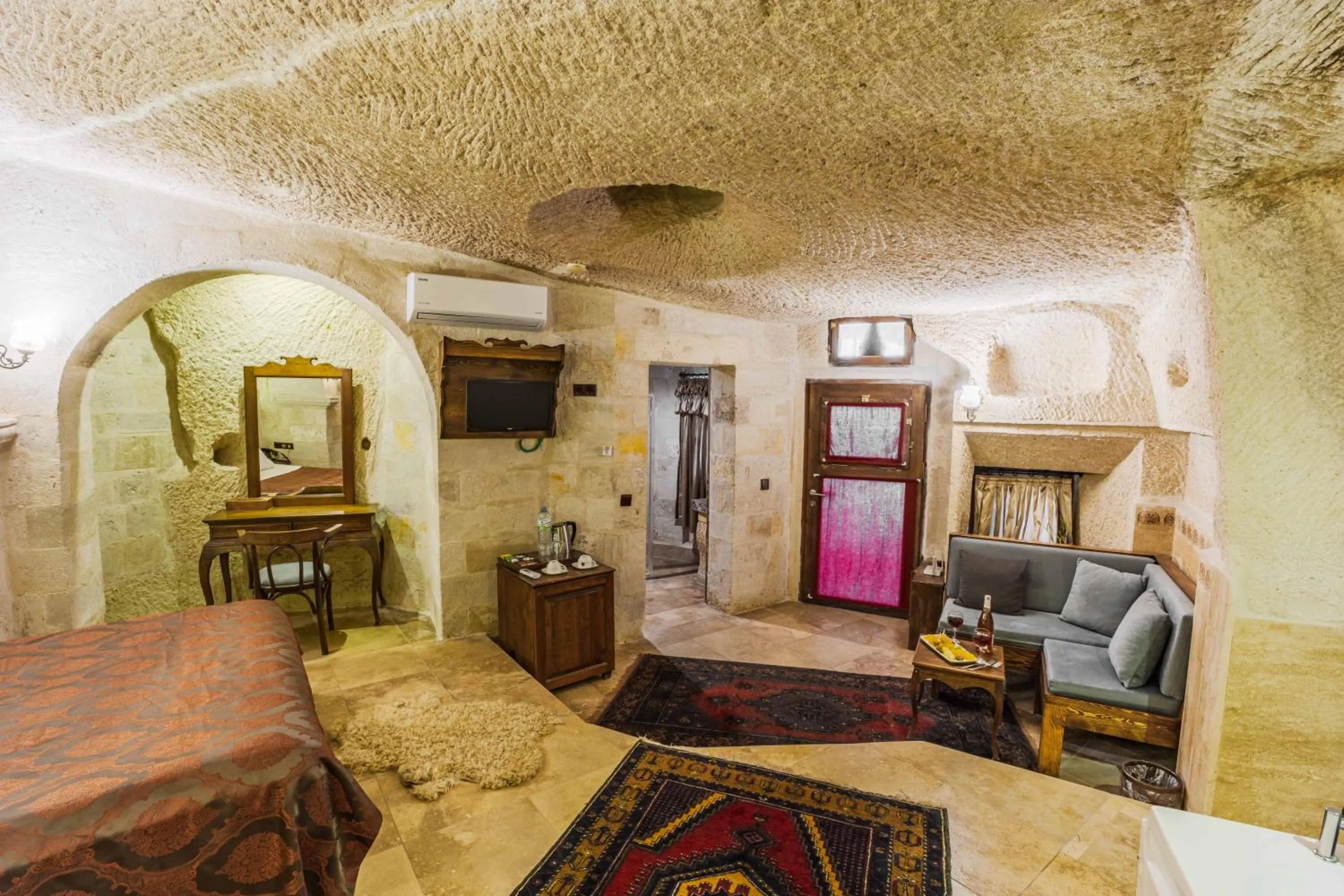 Bed in Phocas Cave Suites