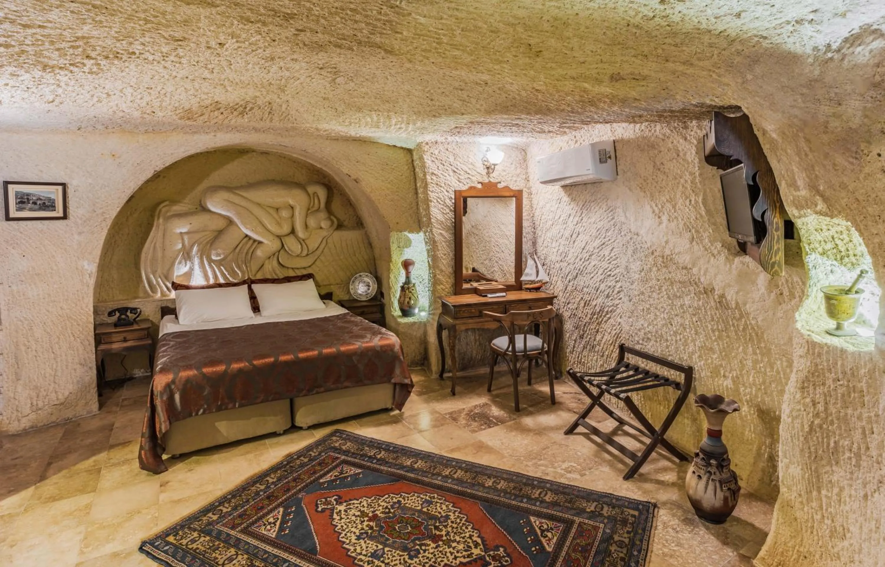 Living room, Bed in Phocas Cave Suites