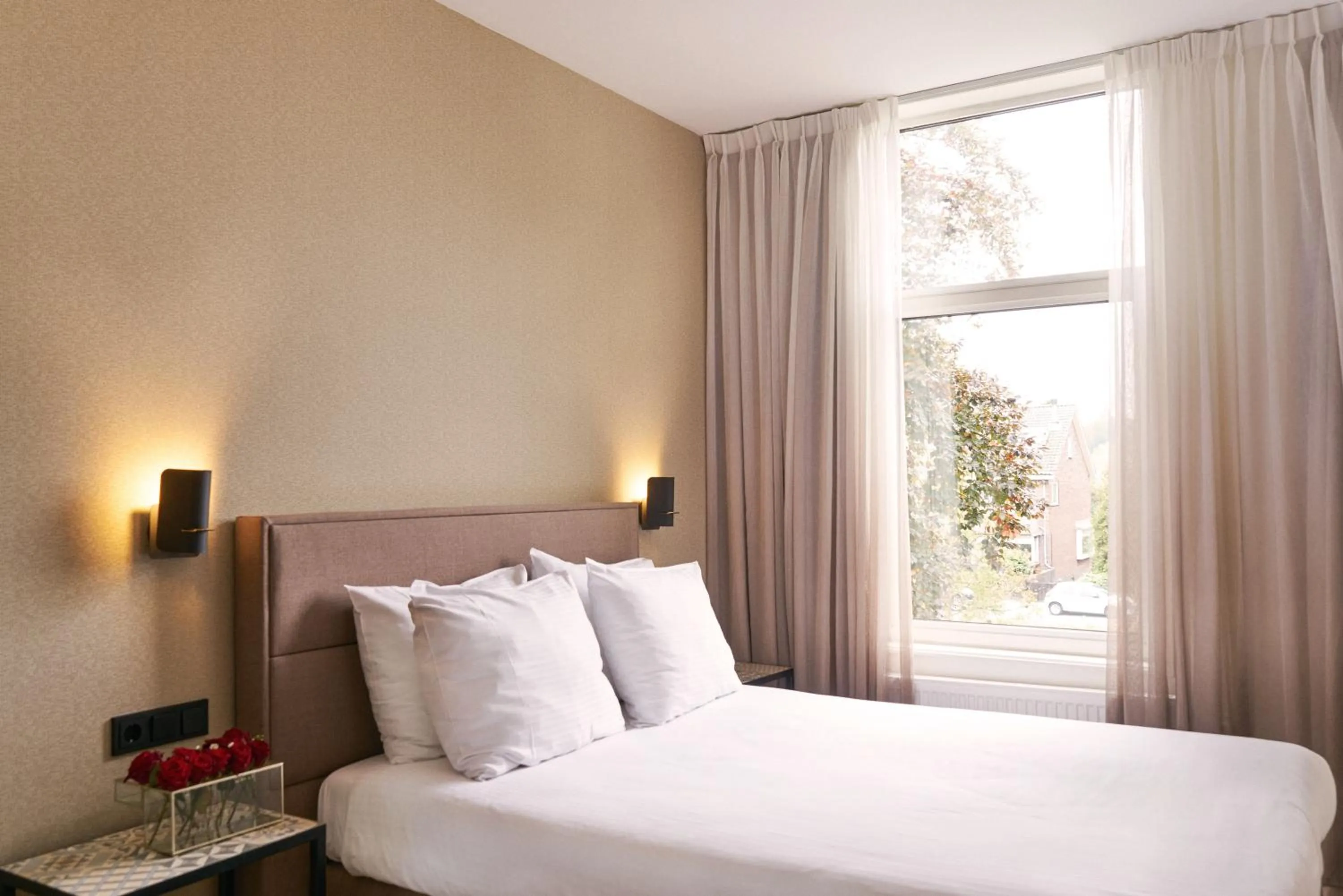 Bed in Alp de Veenen Hotel