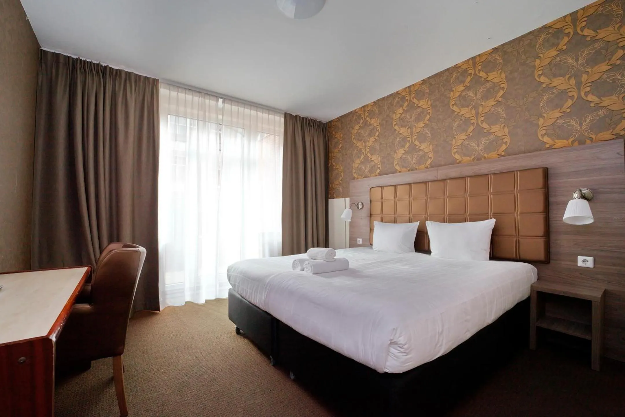 Bed in Aadam Wilhelmina Hotel