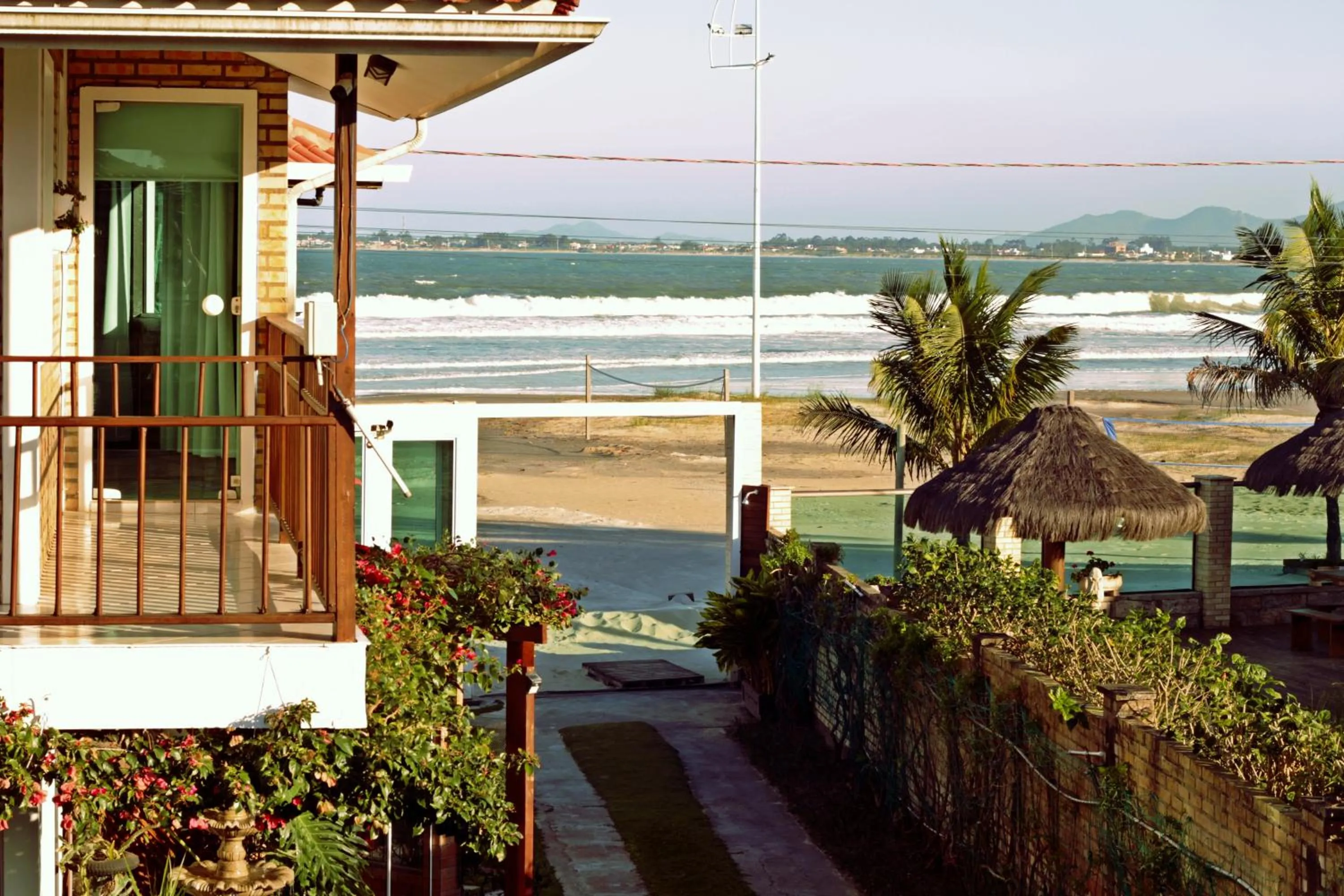 Balcony/Terrace in Pousada Recanto Edênico - à beira mar da Praia Ponta do Papagaio, Palhoça SC