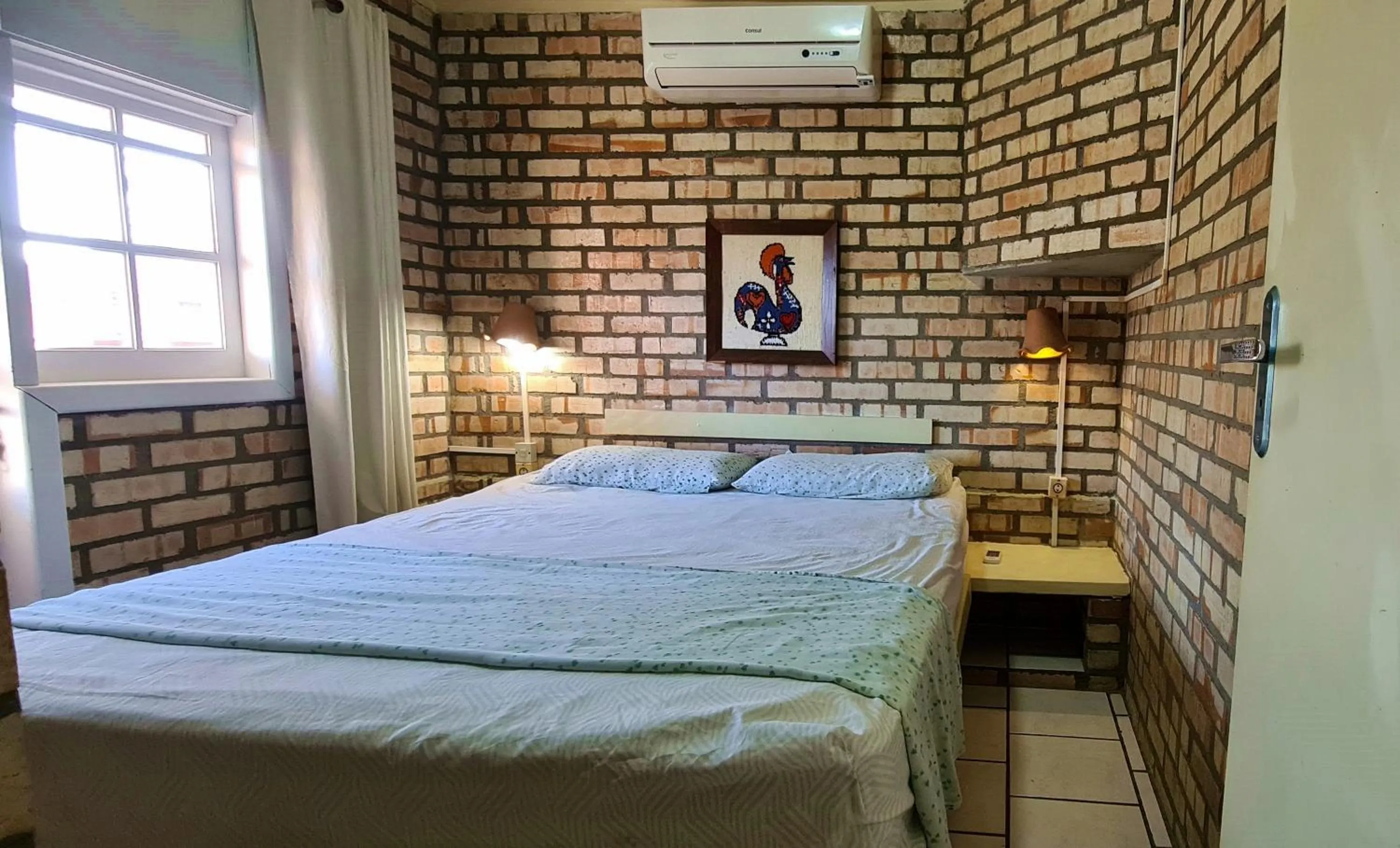 Two-Bedroom Apartment in Pousada Recanto Edênico - à beira mar da Praia Ponta do Papagaio, Palhoça SC