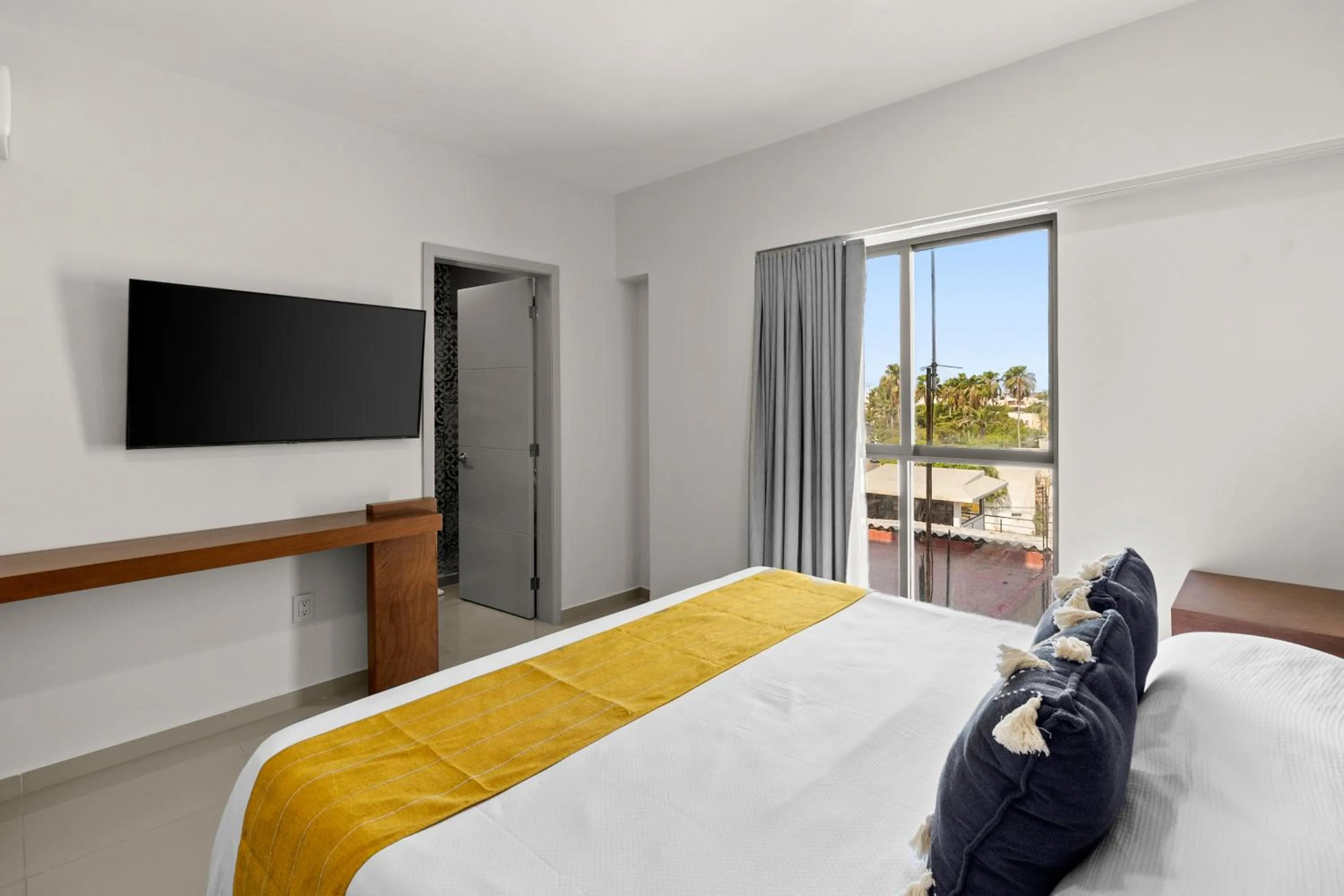 Bed in Casa Barros Vacation Condos