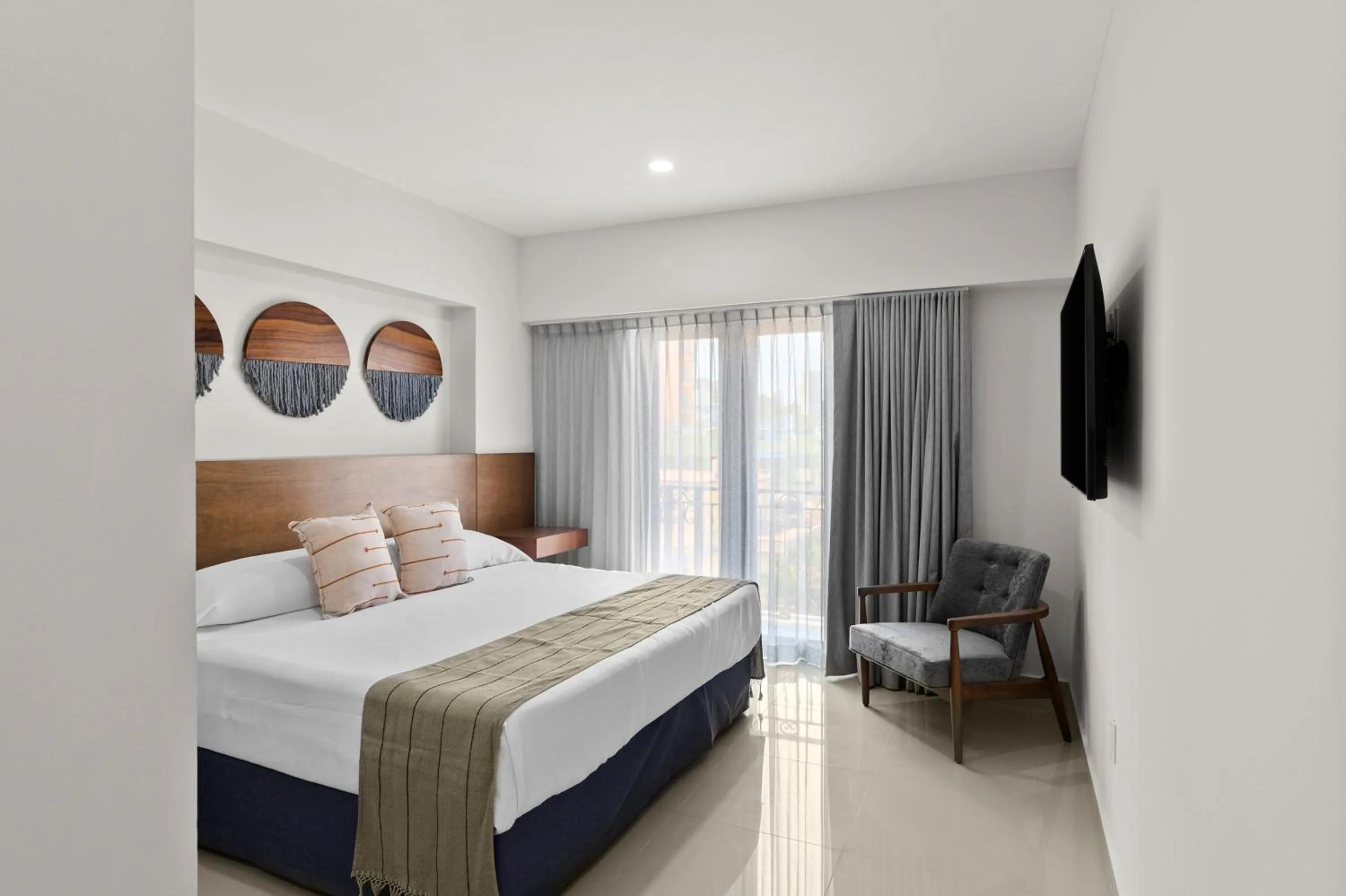 Bed in Casa Barros Vacation Condos