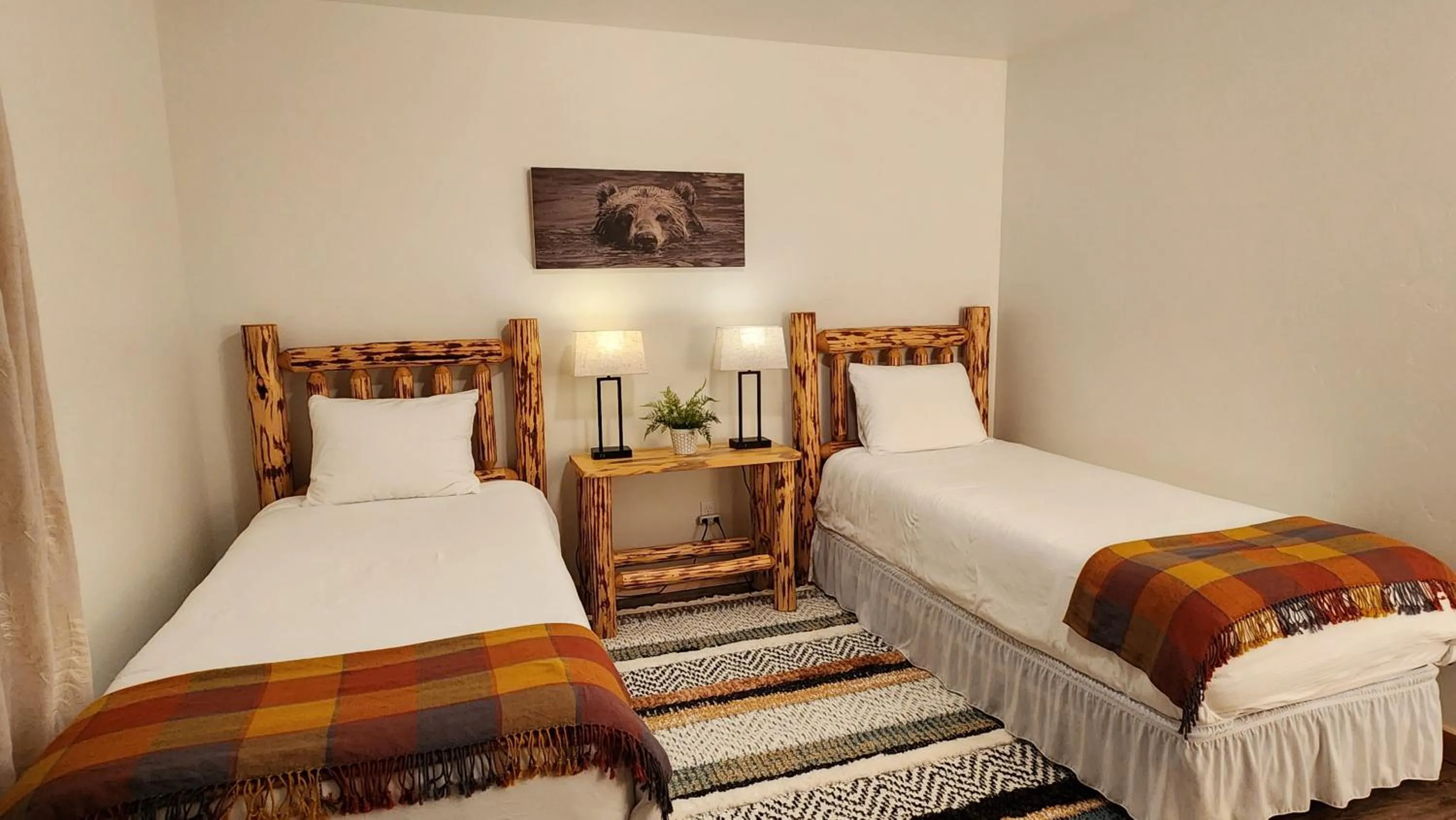 Bed in Beargrass Lodging & RV Resort