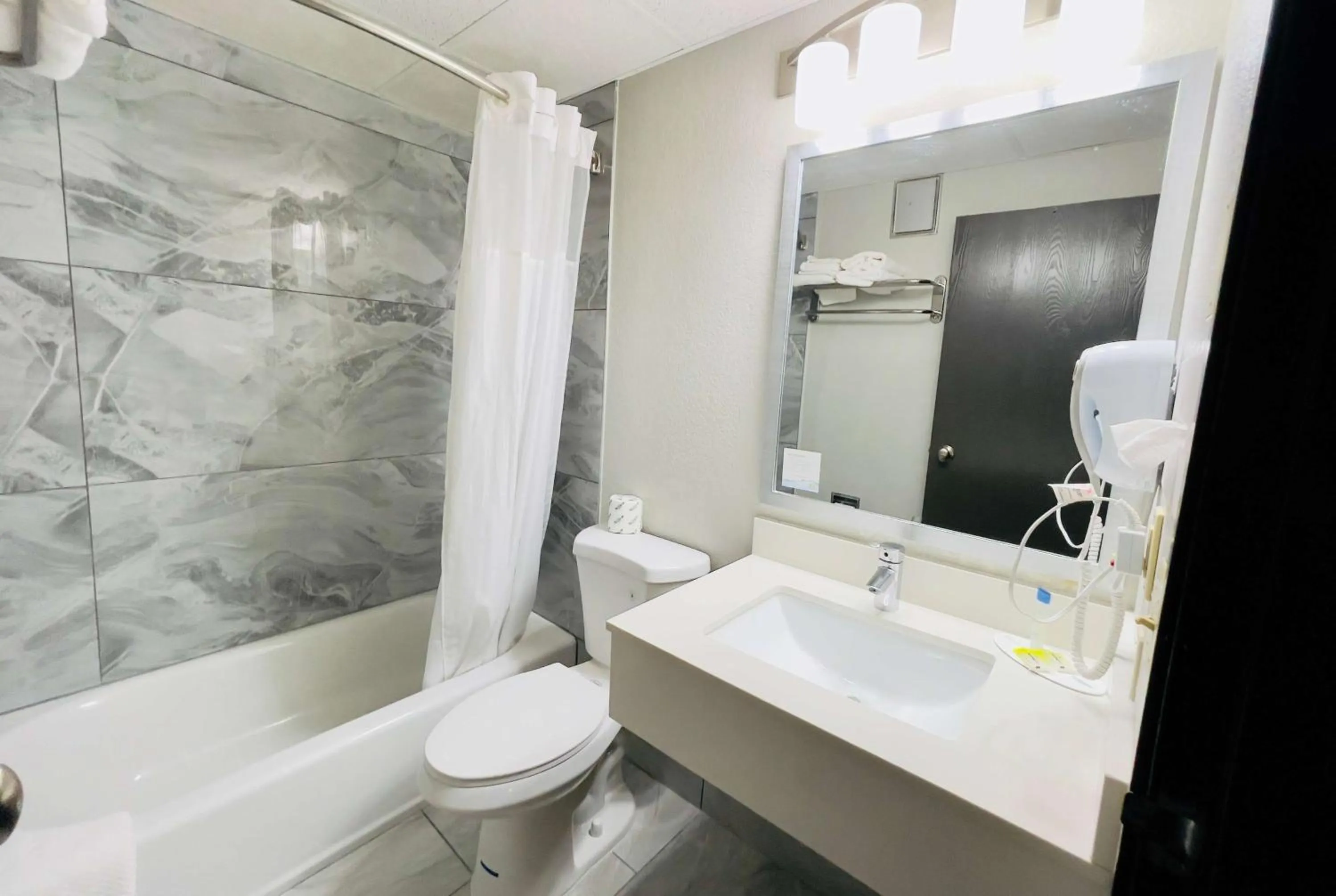 Bathroom in Super 8 by Wyndham Shakopee