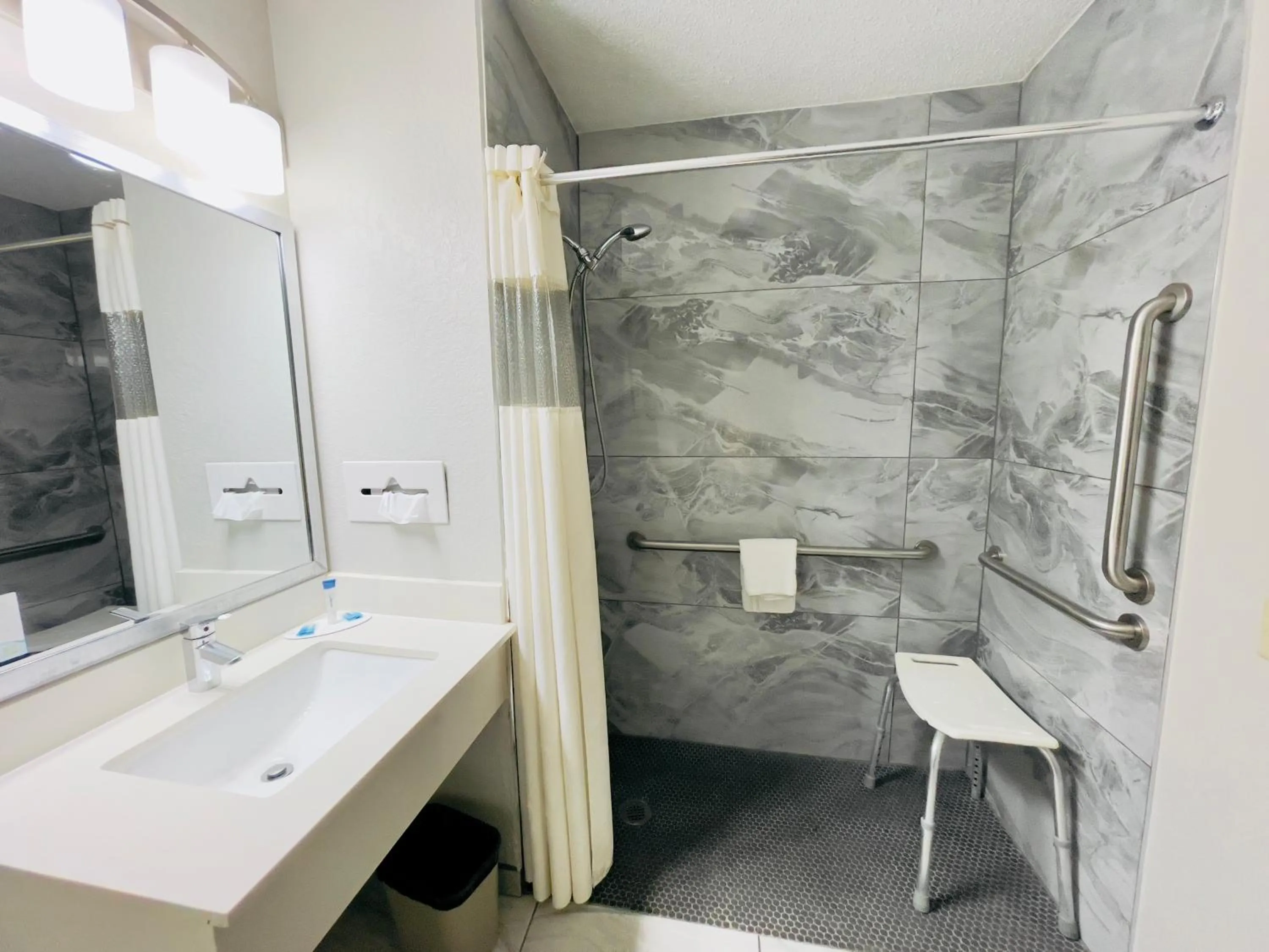 Shower in Super 8 by Wyndham Shakopee