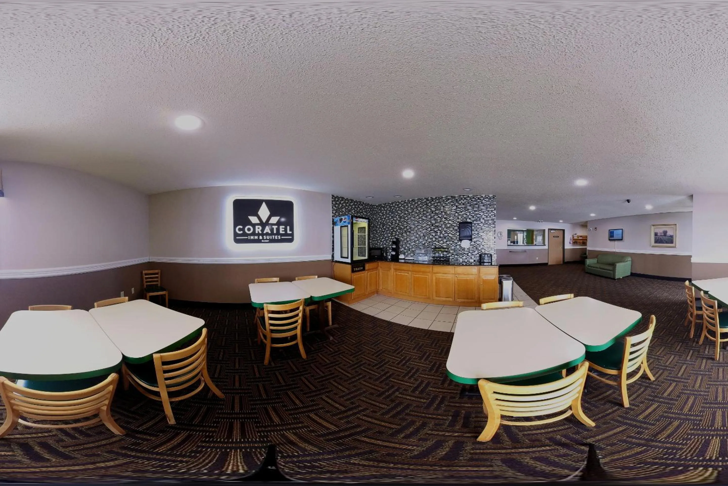 Dining area in Coratel Inn & Suites by Jasper New Richmond