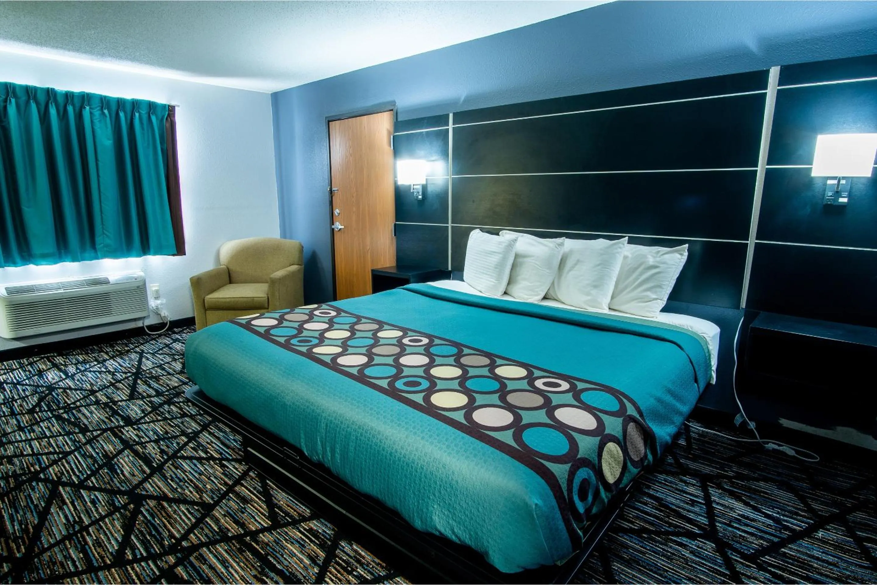 Bedroom, Bed in Coratel Inn & Suites by Jasper New Richmond