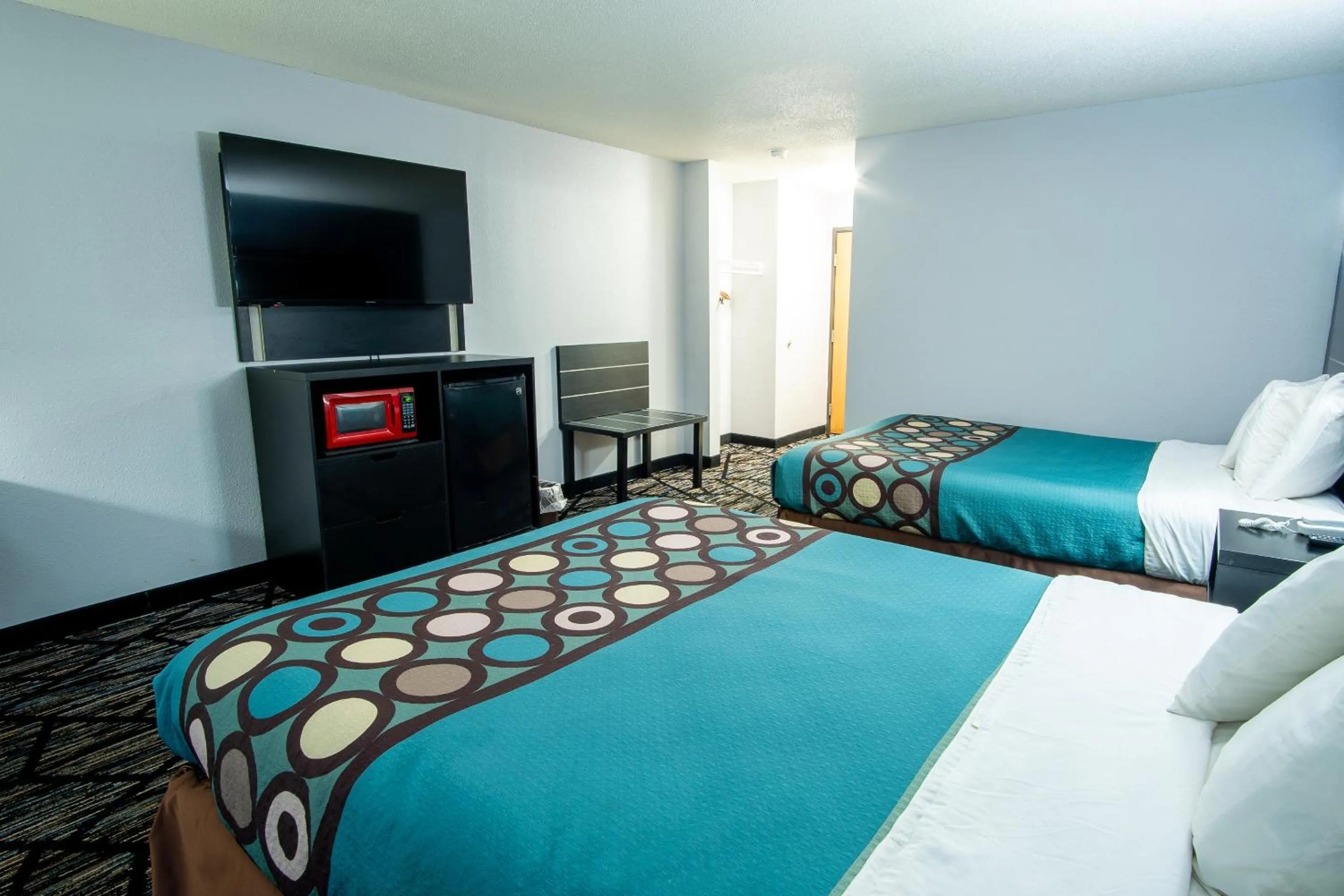Bed in Coratel Inn & Suites by Jasper New Richmond