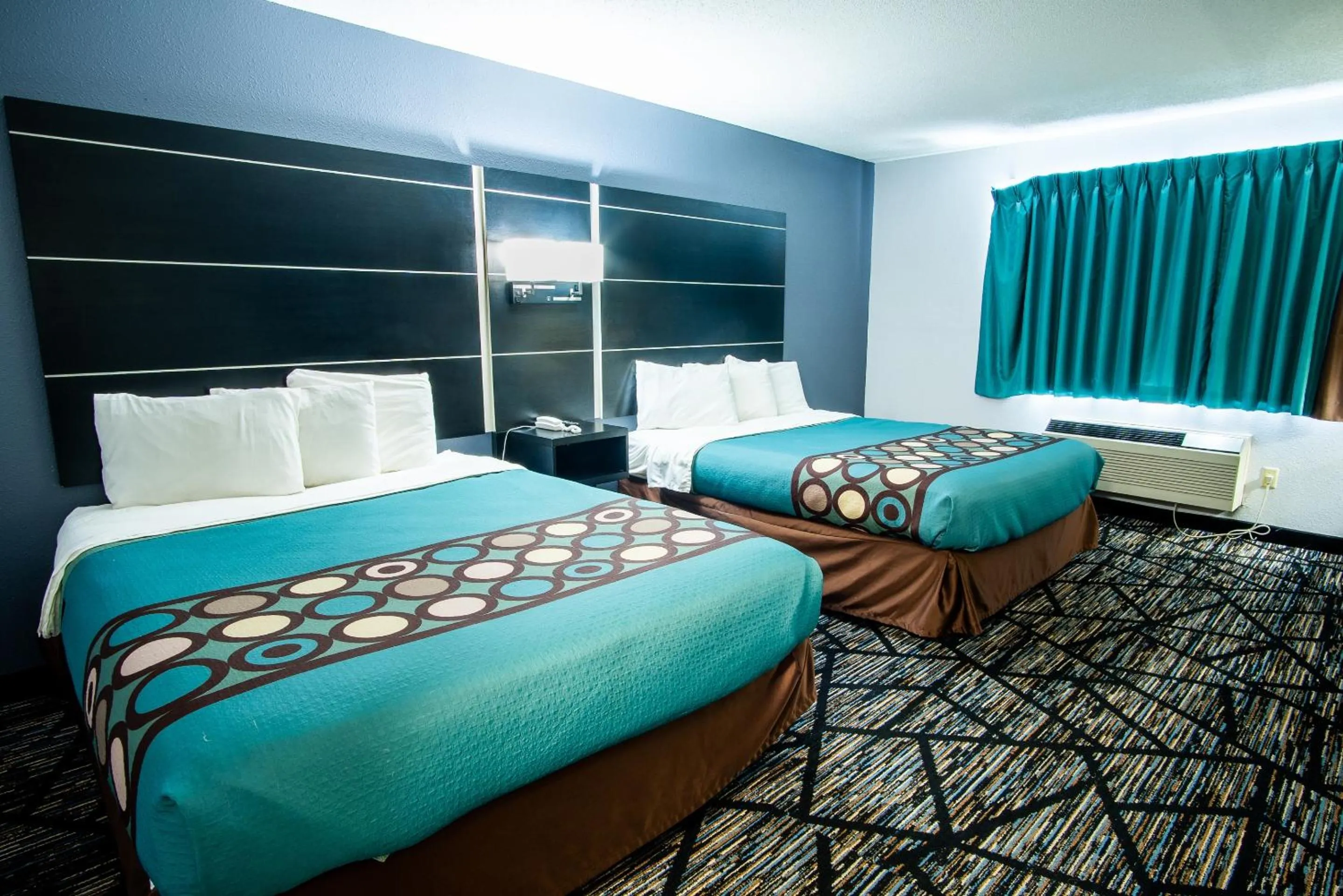 Bedroom, Bed in Coratel Inn & Suites by Jasper New Richmond