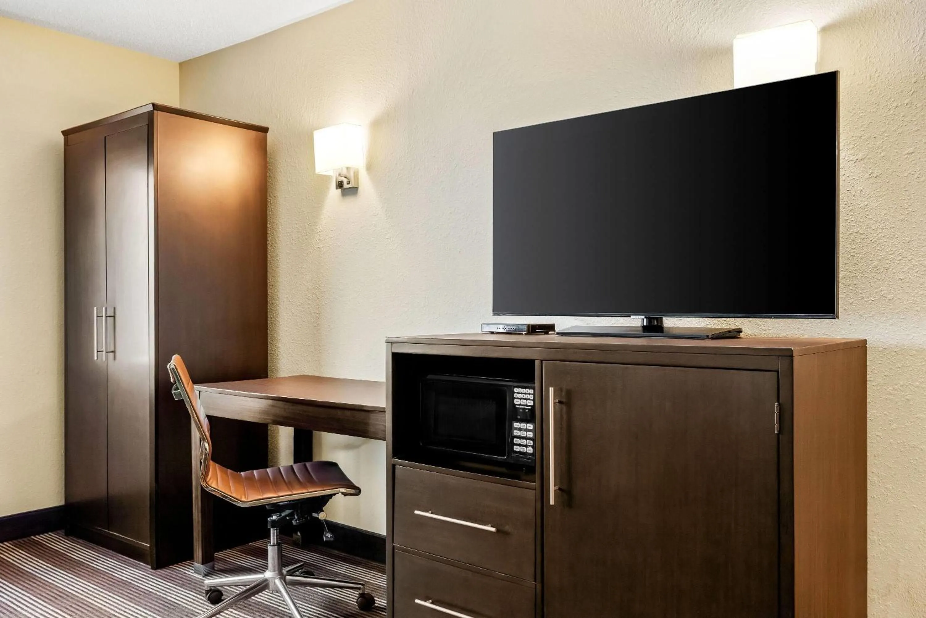 Bed in Super 8 by Wyndham Osseo WI