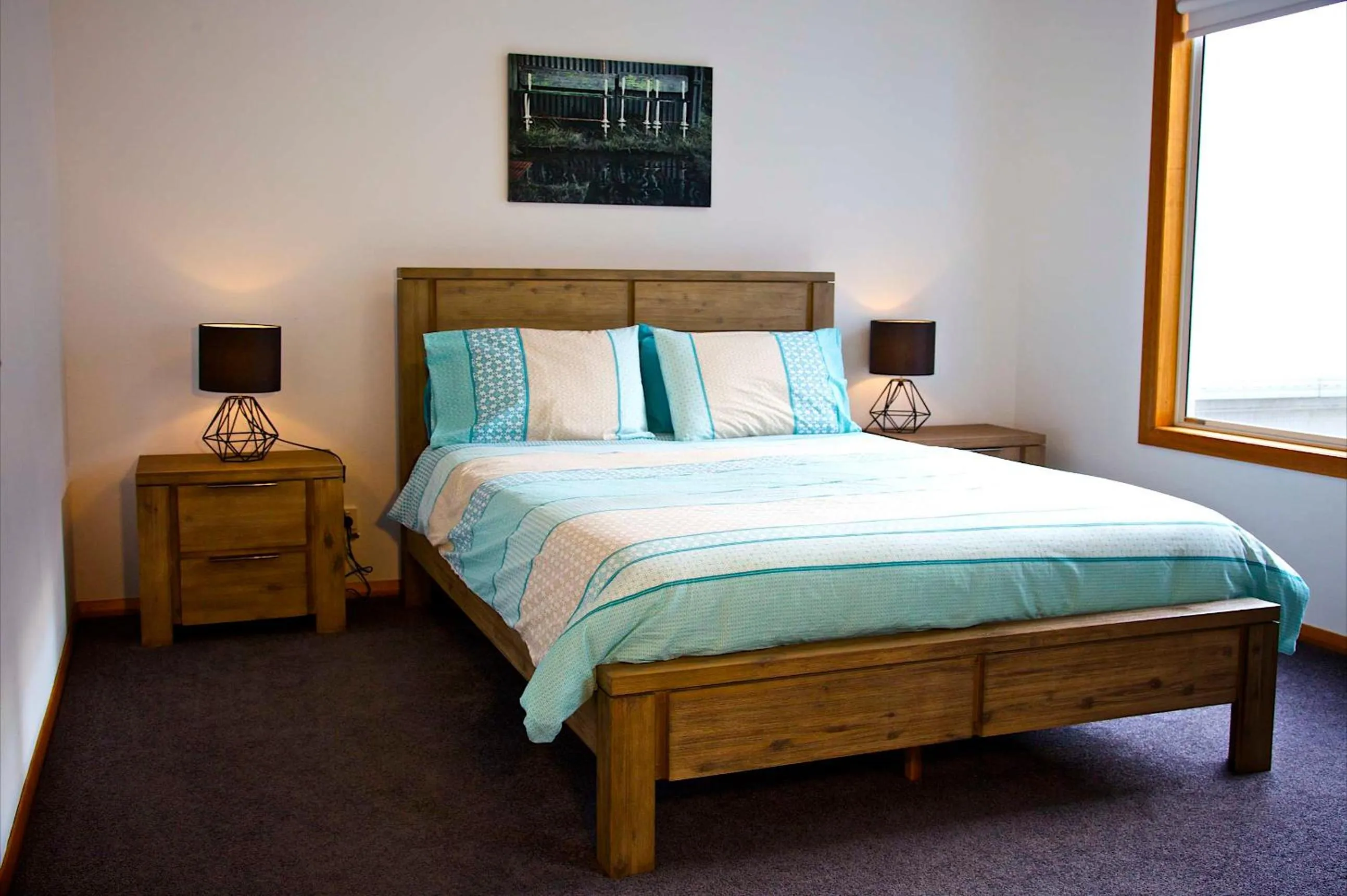 Bed in Penguin Beachfront Apartments