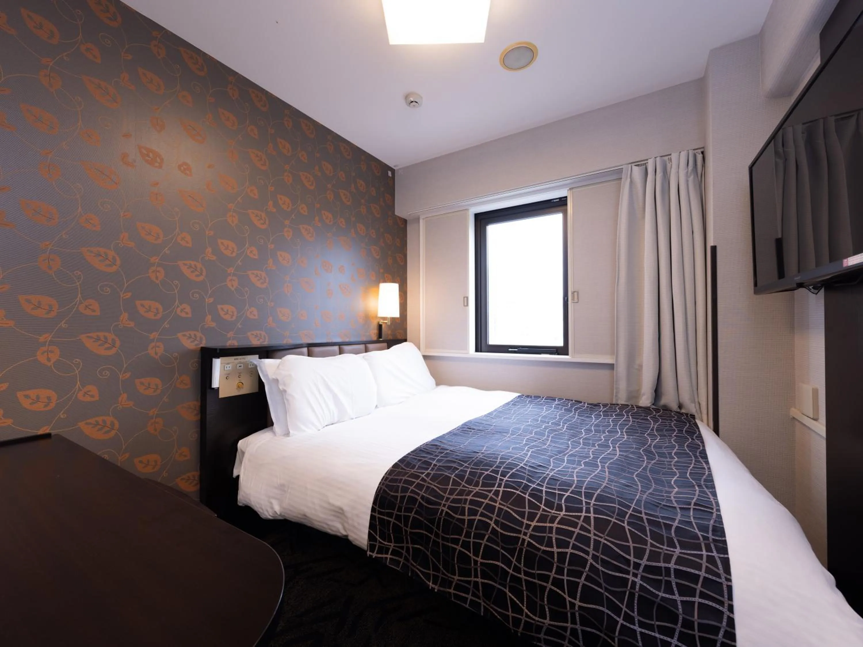 Bed in APA Hotel Aomori Ekihigashi