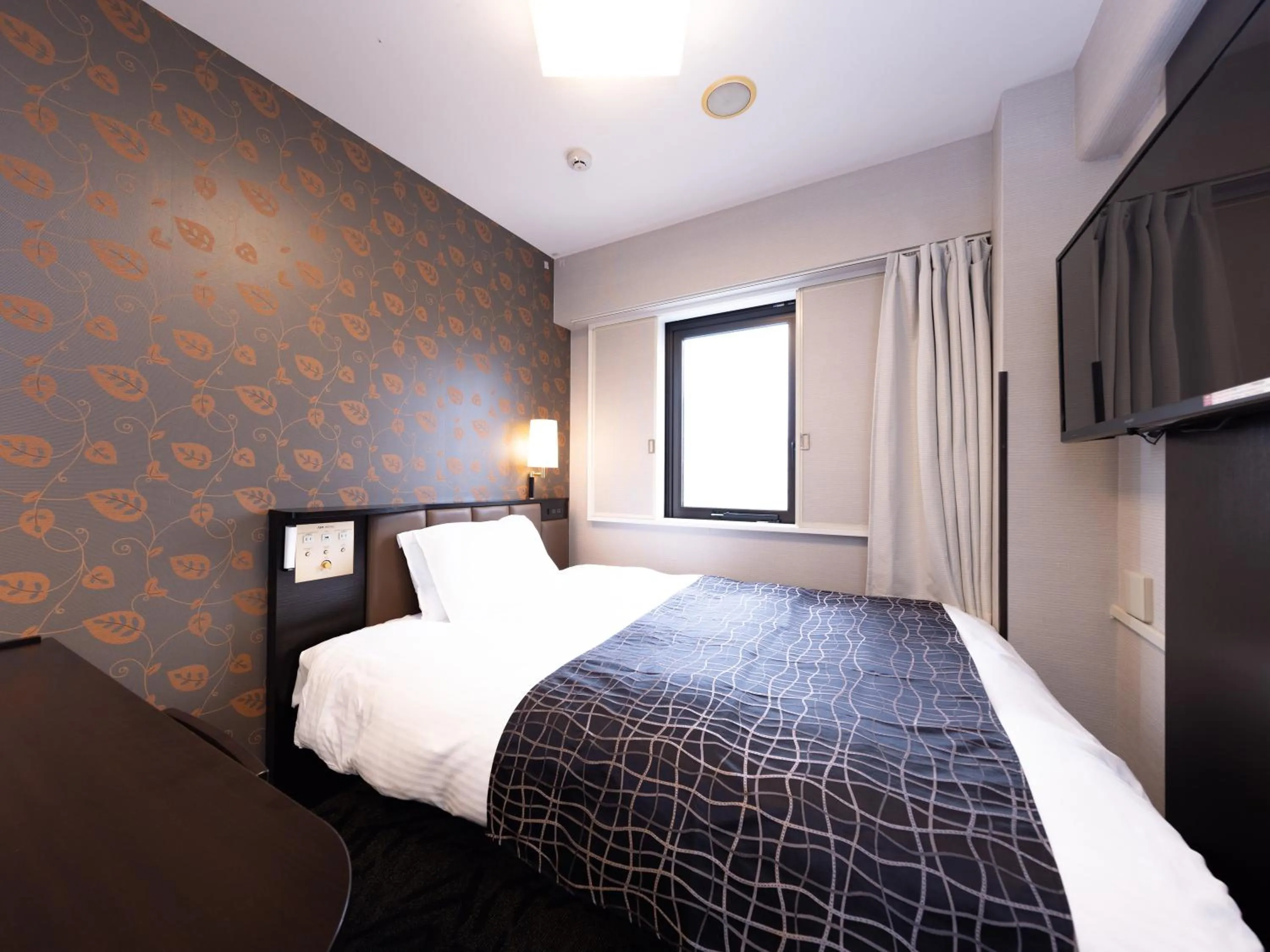 Bed in APA Hotel Aomori Ekihigashi