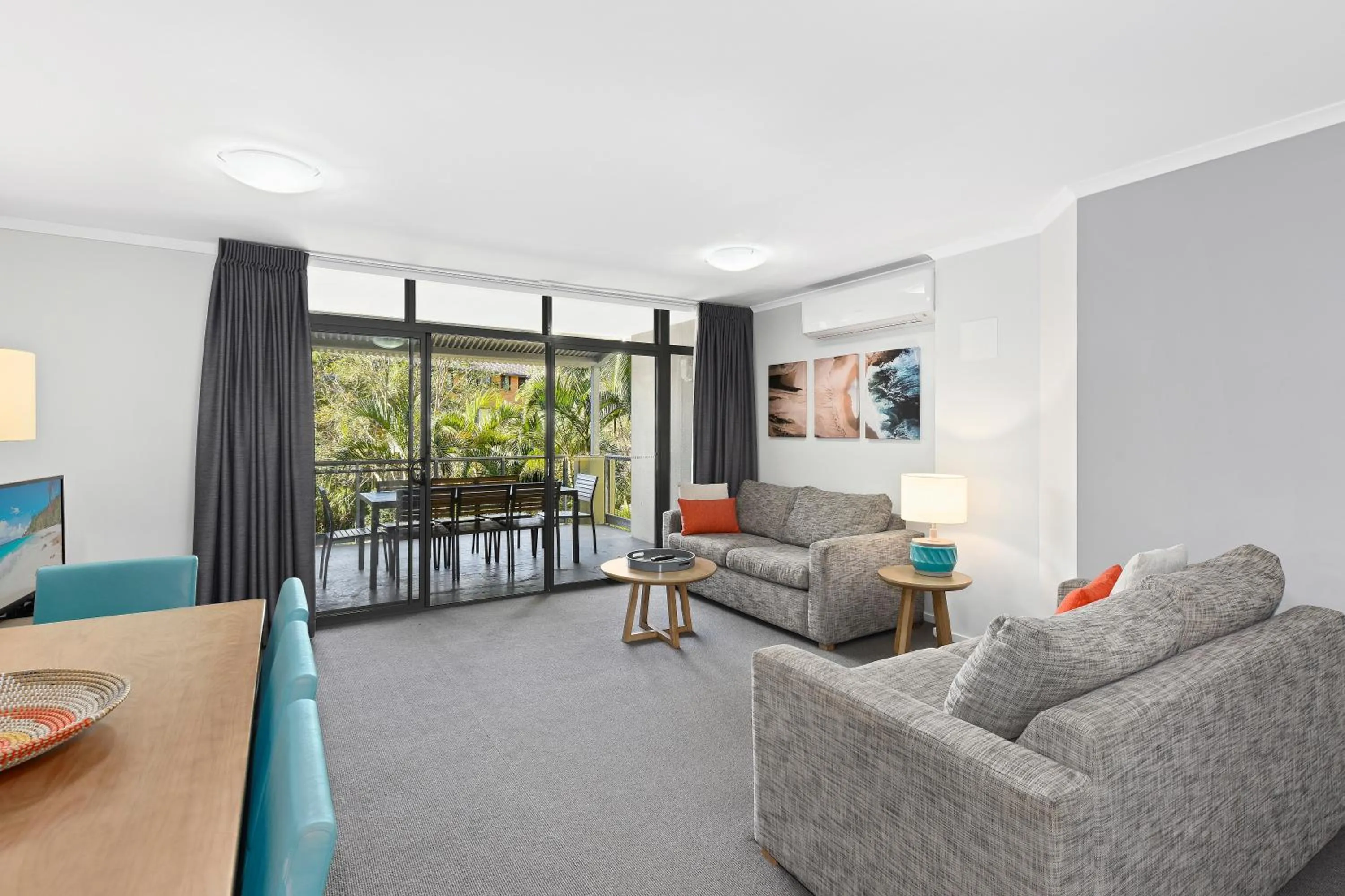 Living room in Club Wyndham Flynns Beach, Trademark Collection by Wyndham