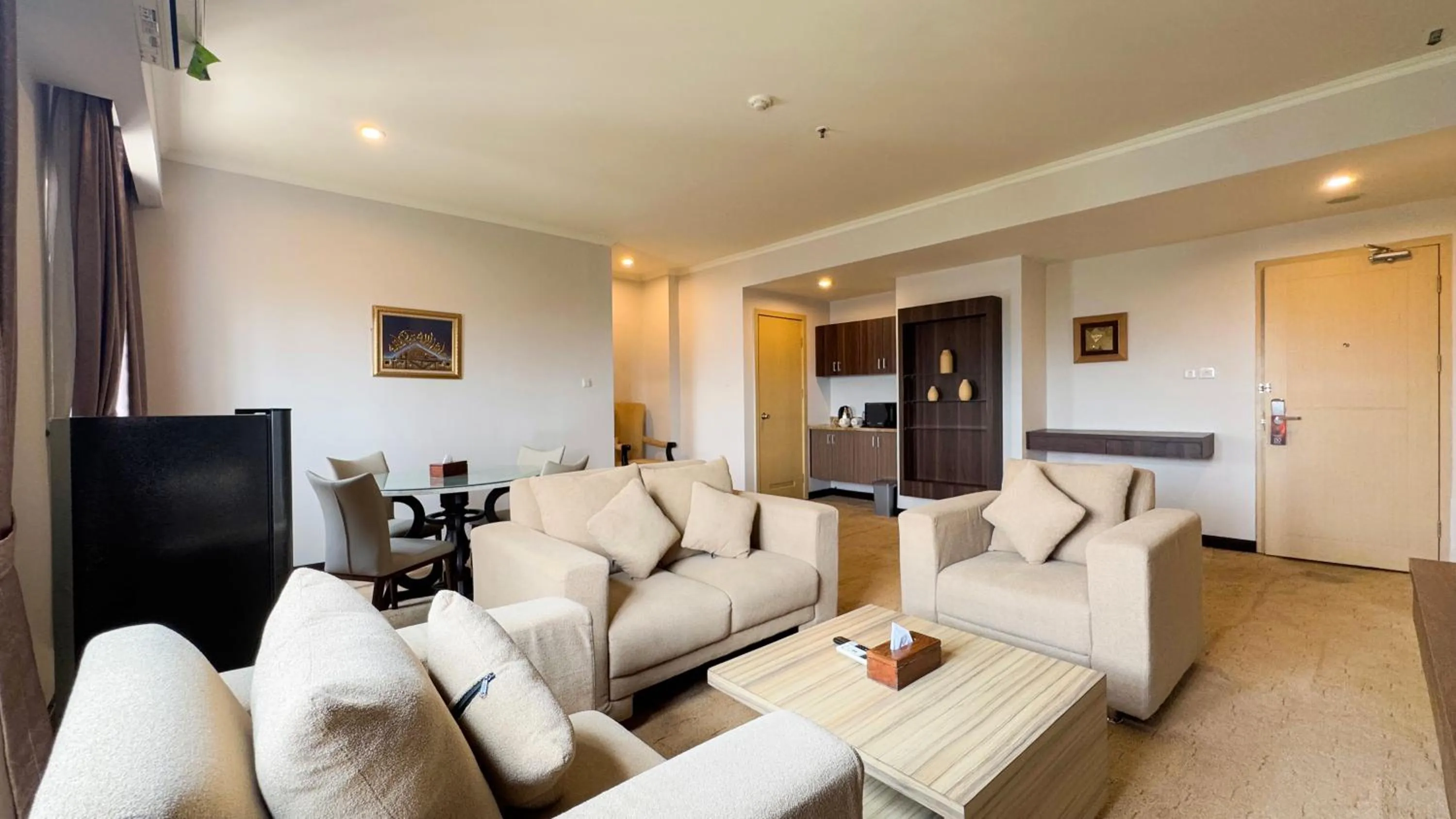 Living room in Lorin Syariah Solo Hotel