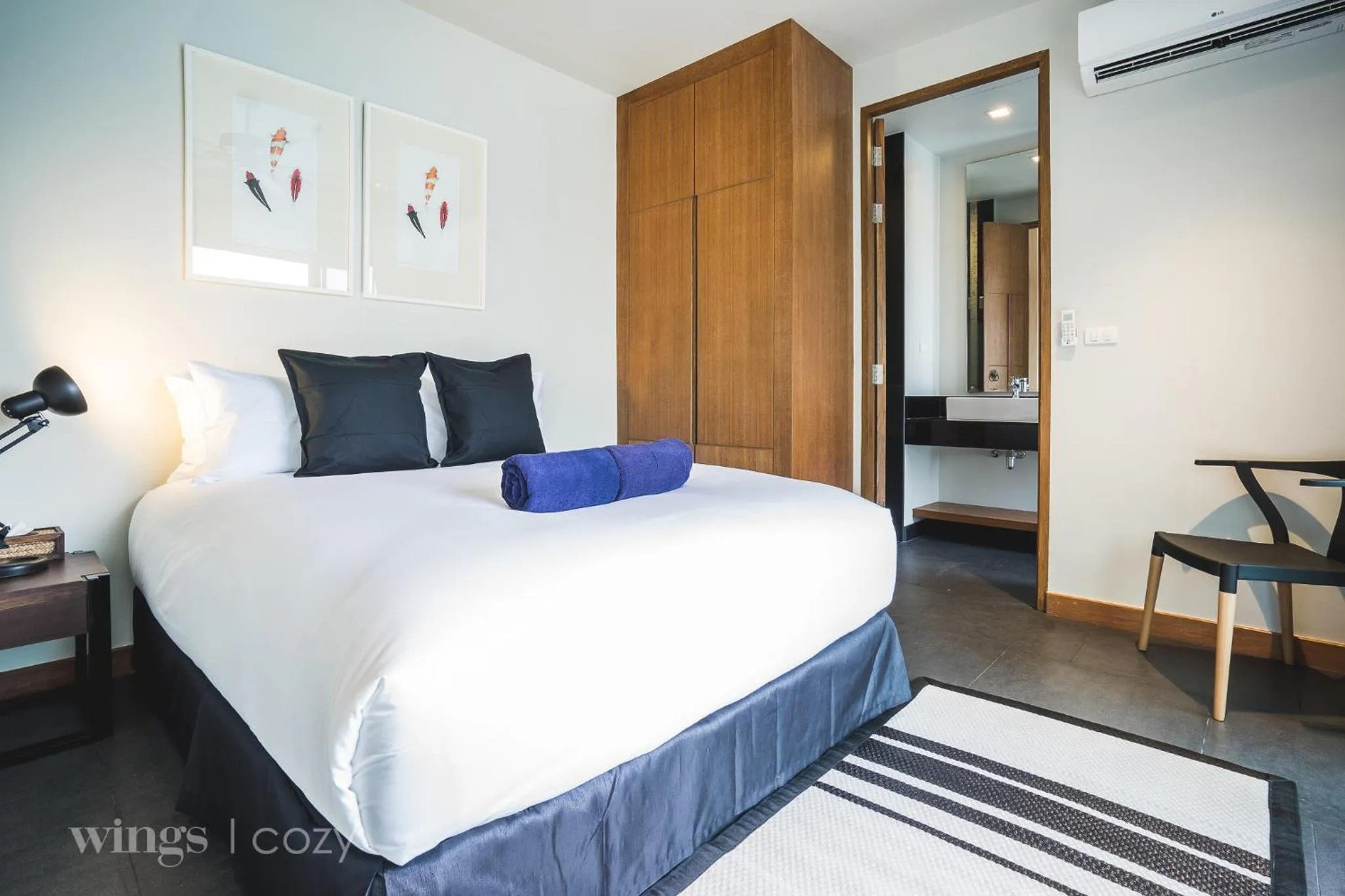 Text overlay, Bed in Wings Phuket Villa by Two Villas HOLIDAY