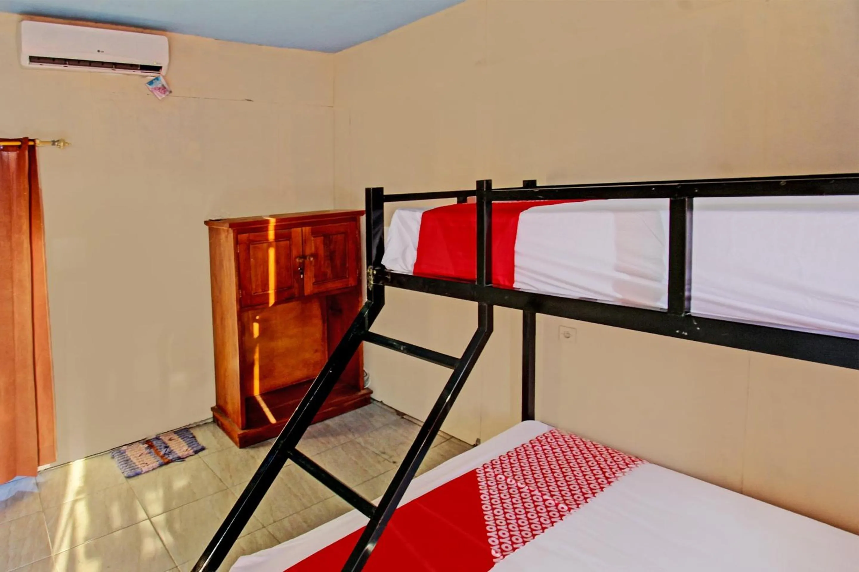 Bedroom in OYO 93121 Abi Bungalow & Hostel