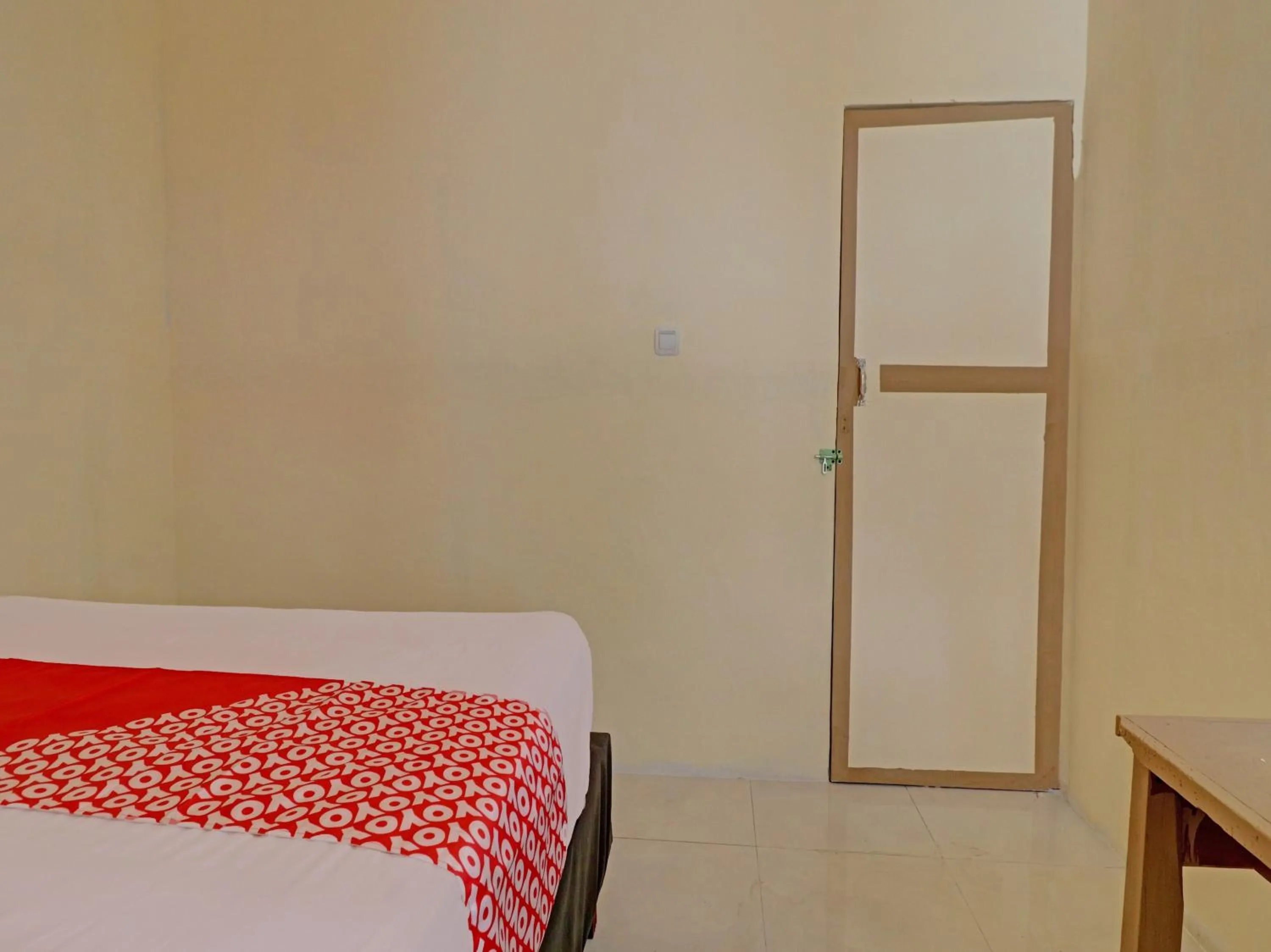 Bedroom, Bed in Hotel O Excellent Kost