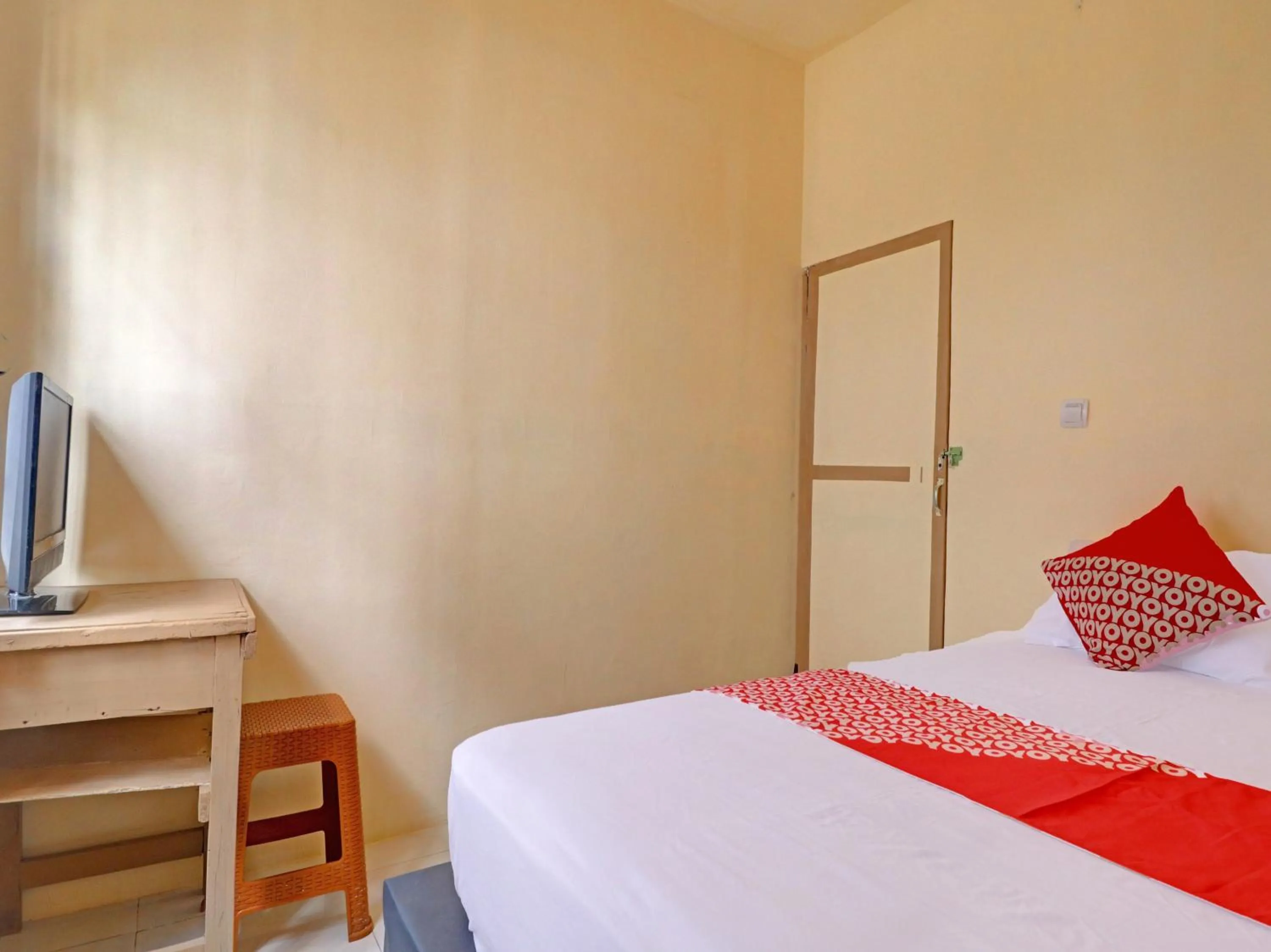 Bedroom, Bed in Hotel O Excellent Kost