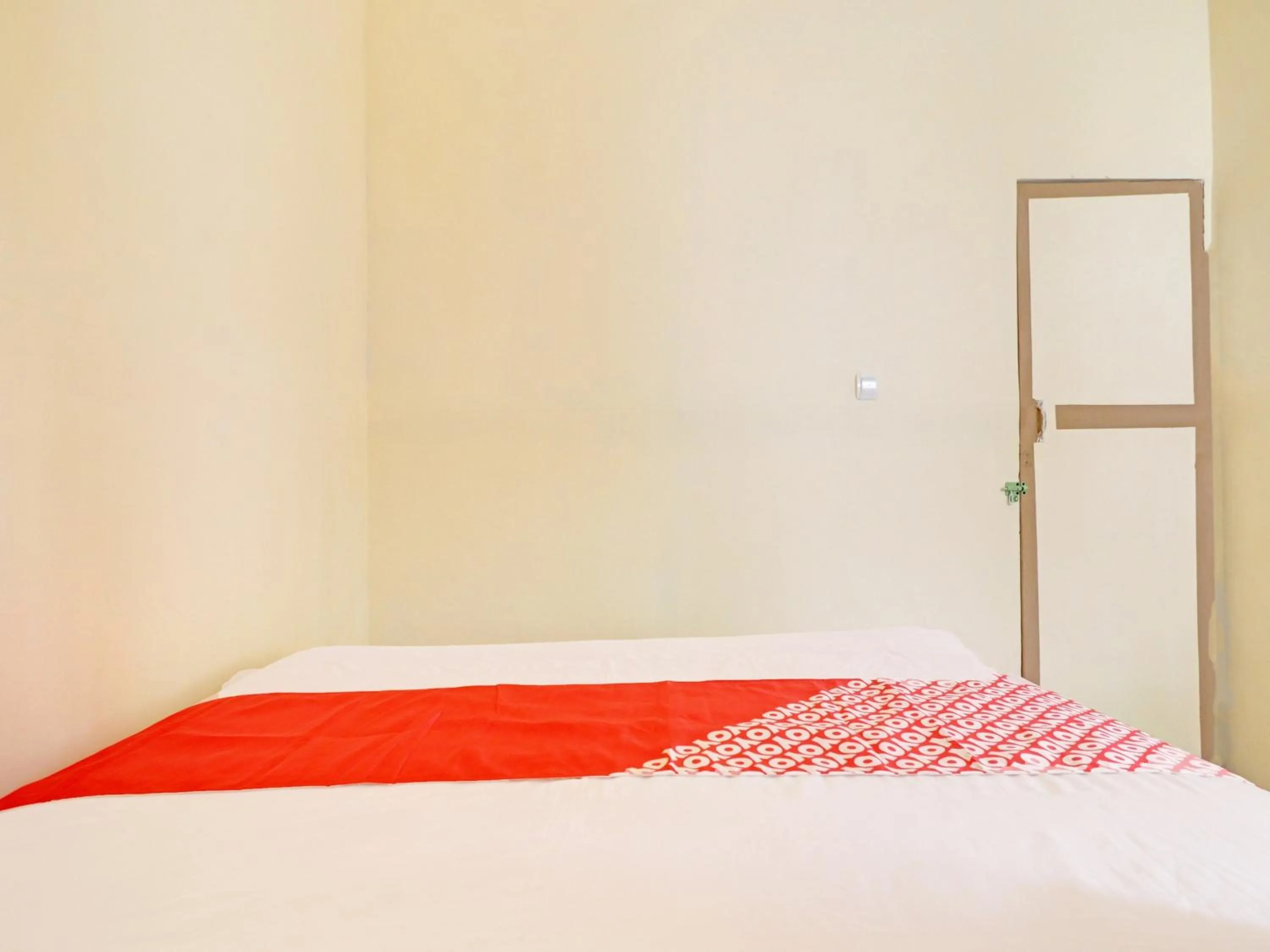 Bedroom, Bed in Hotel O Excellent Kost