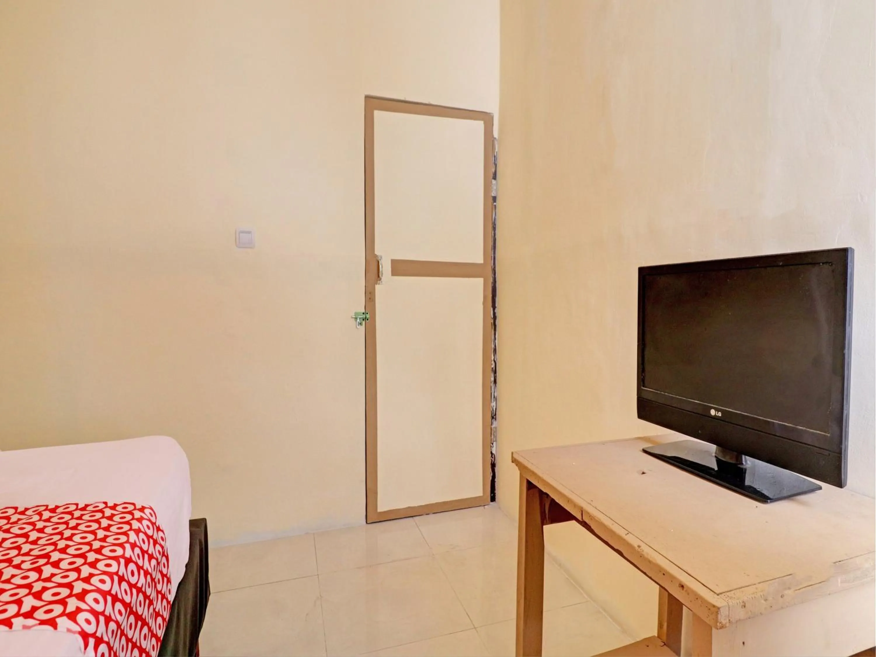 Bedroom, Bed in Hotel O Excellent Kost