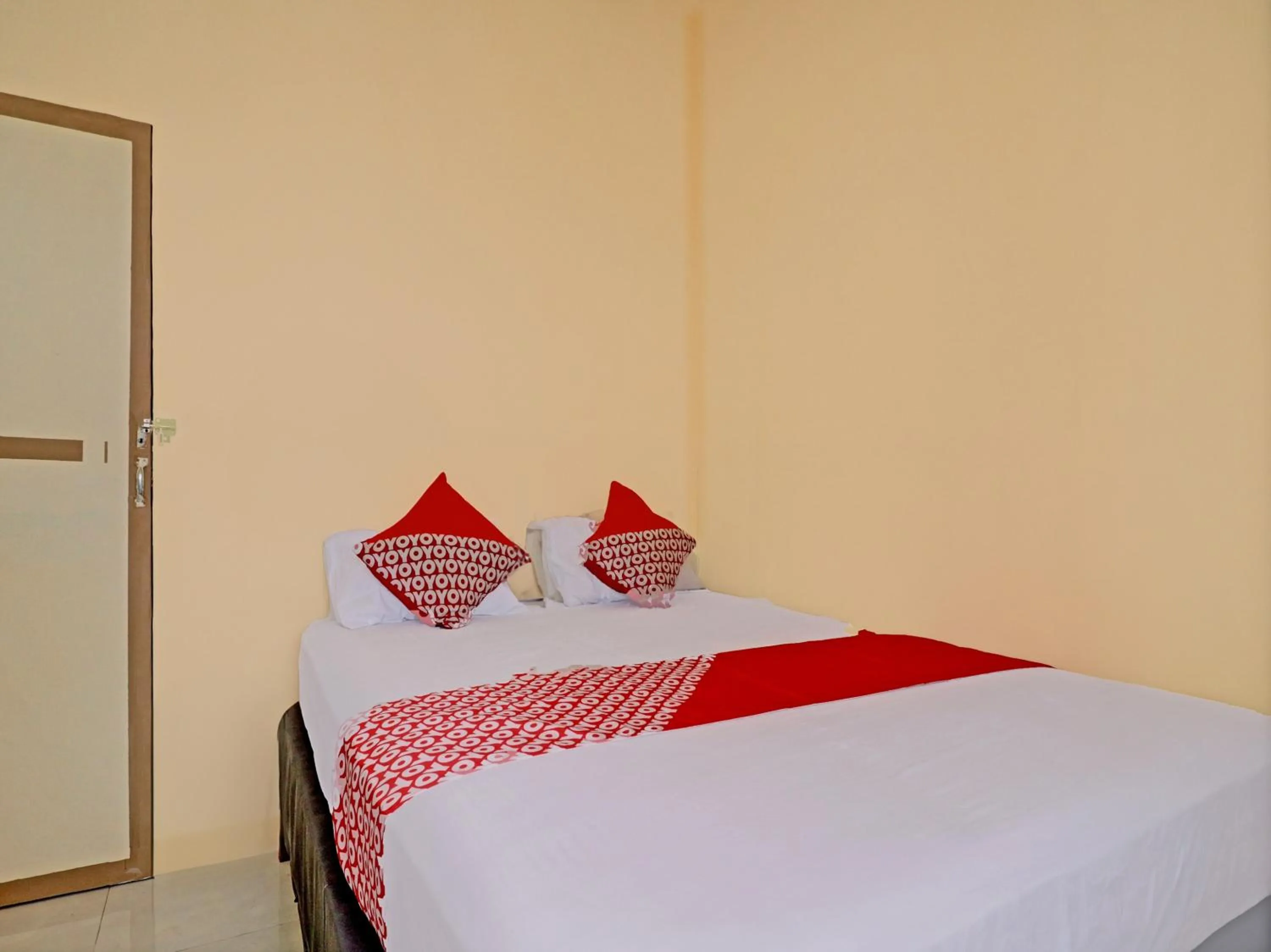 Bedroom, Bed in Hotel O Excellent Kost