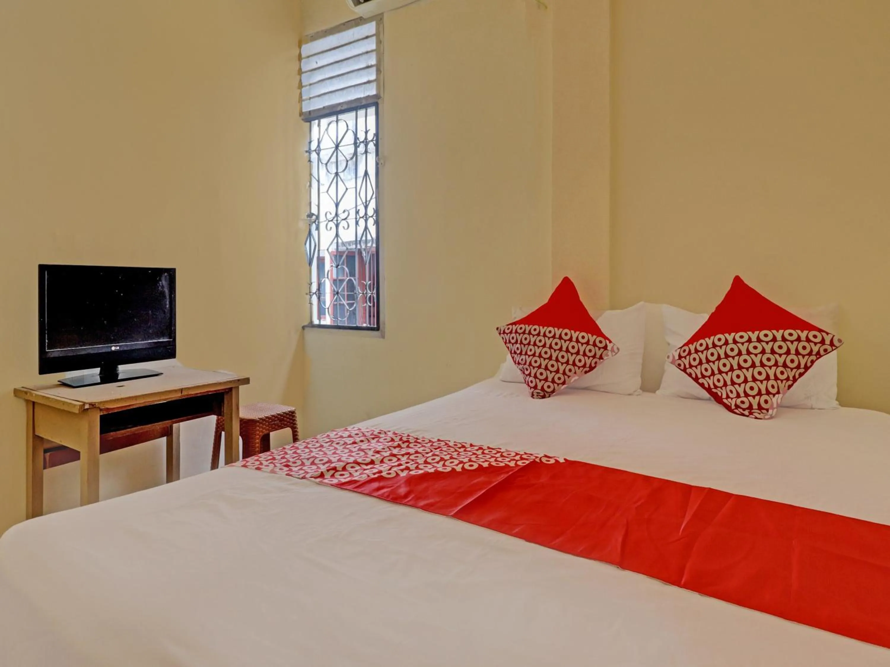 Bedroom, Bed in Hotel O Excellent Kost