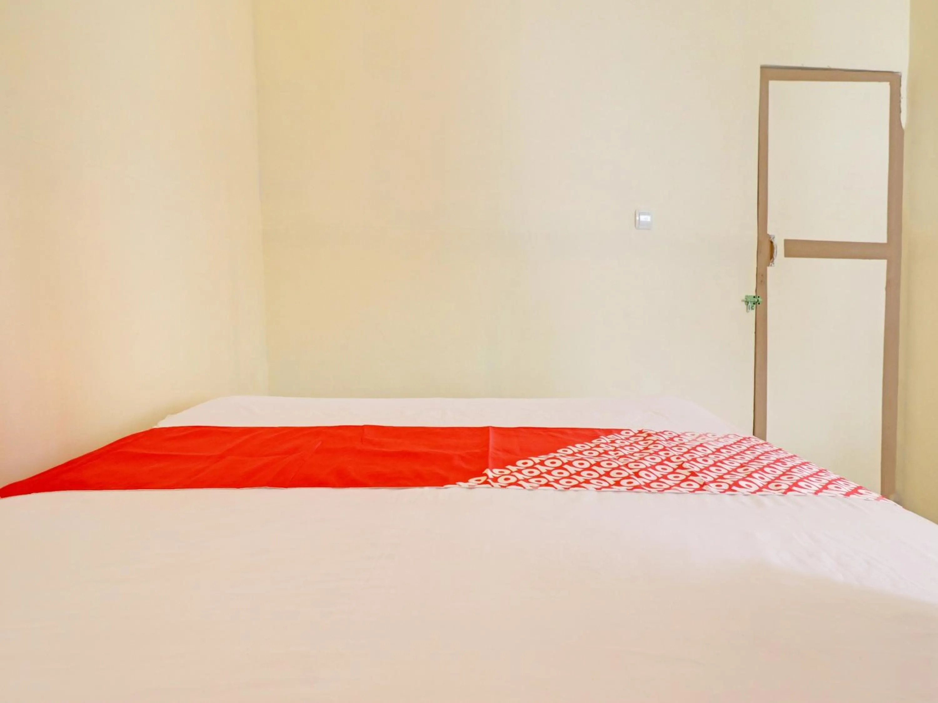 Bedroom, Bed in Hotel O Excellent Kost