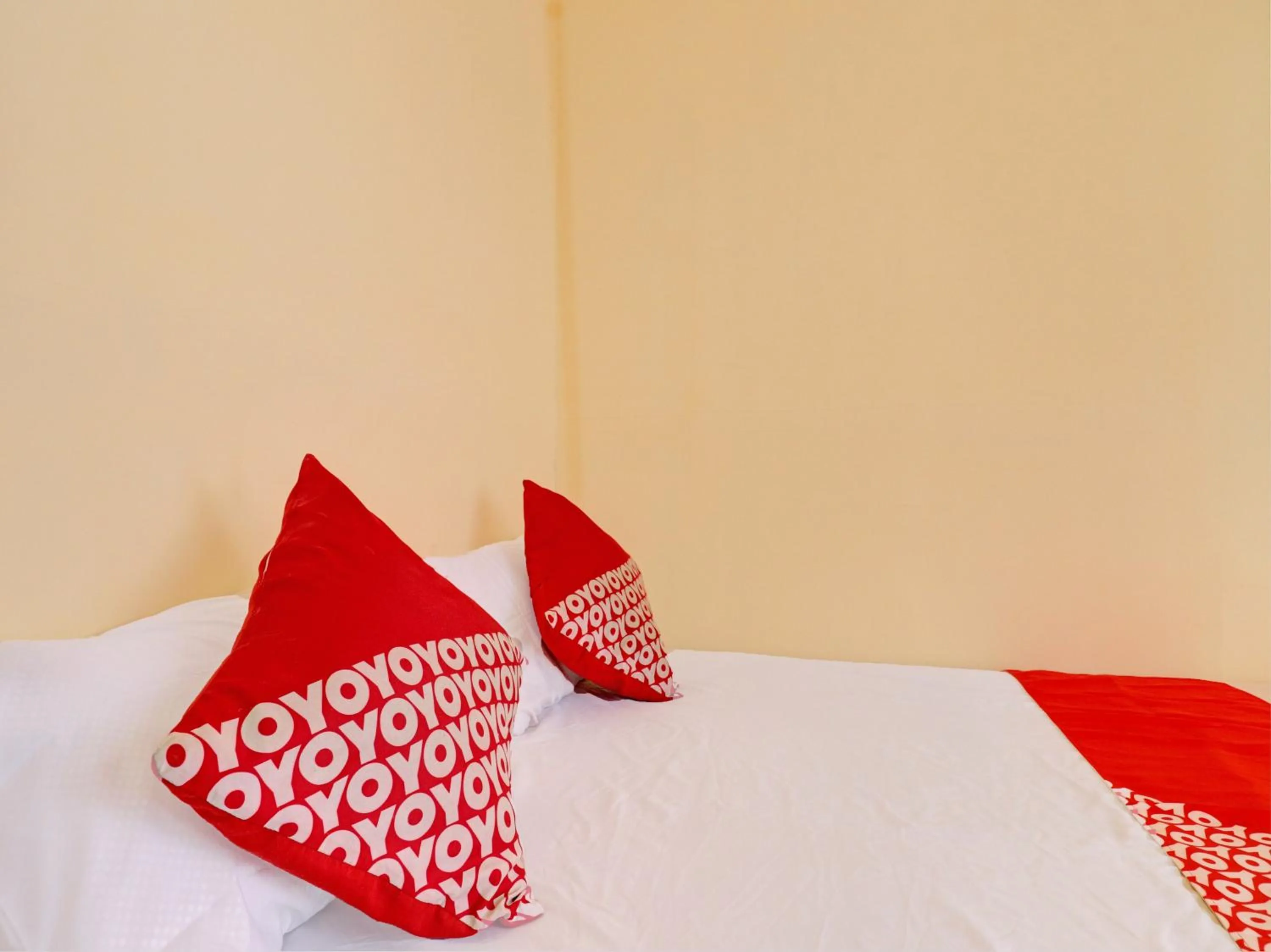 Bedroom, Bed in Hotel O Excellent Kost