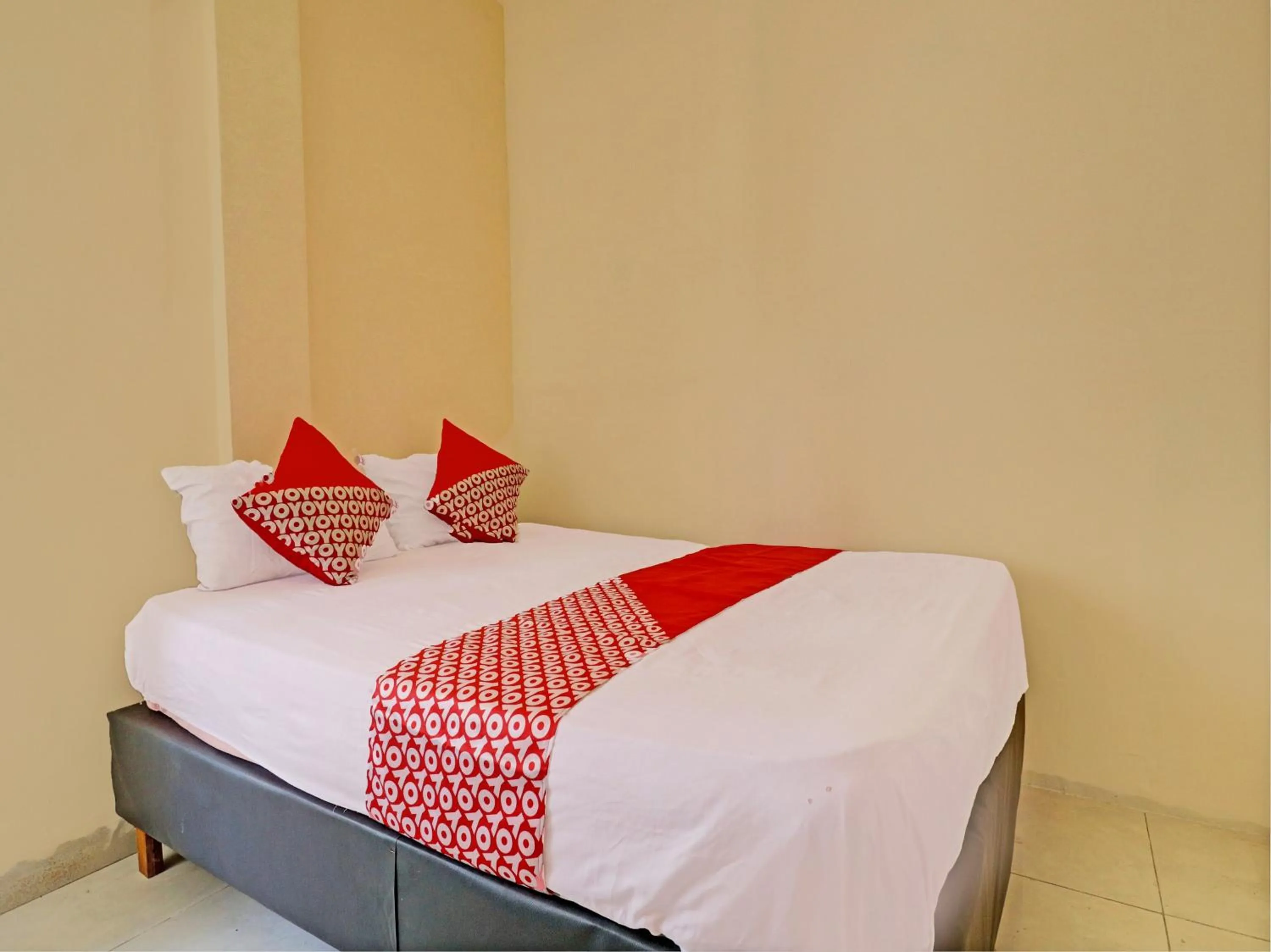 Bedroom, Bed in Hotel O Excellent Kost