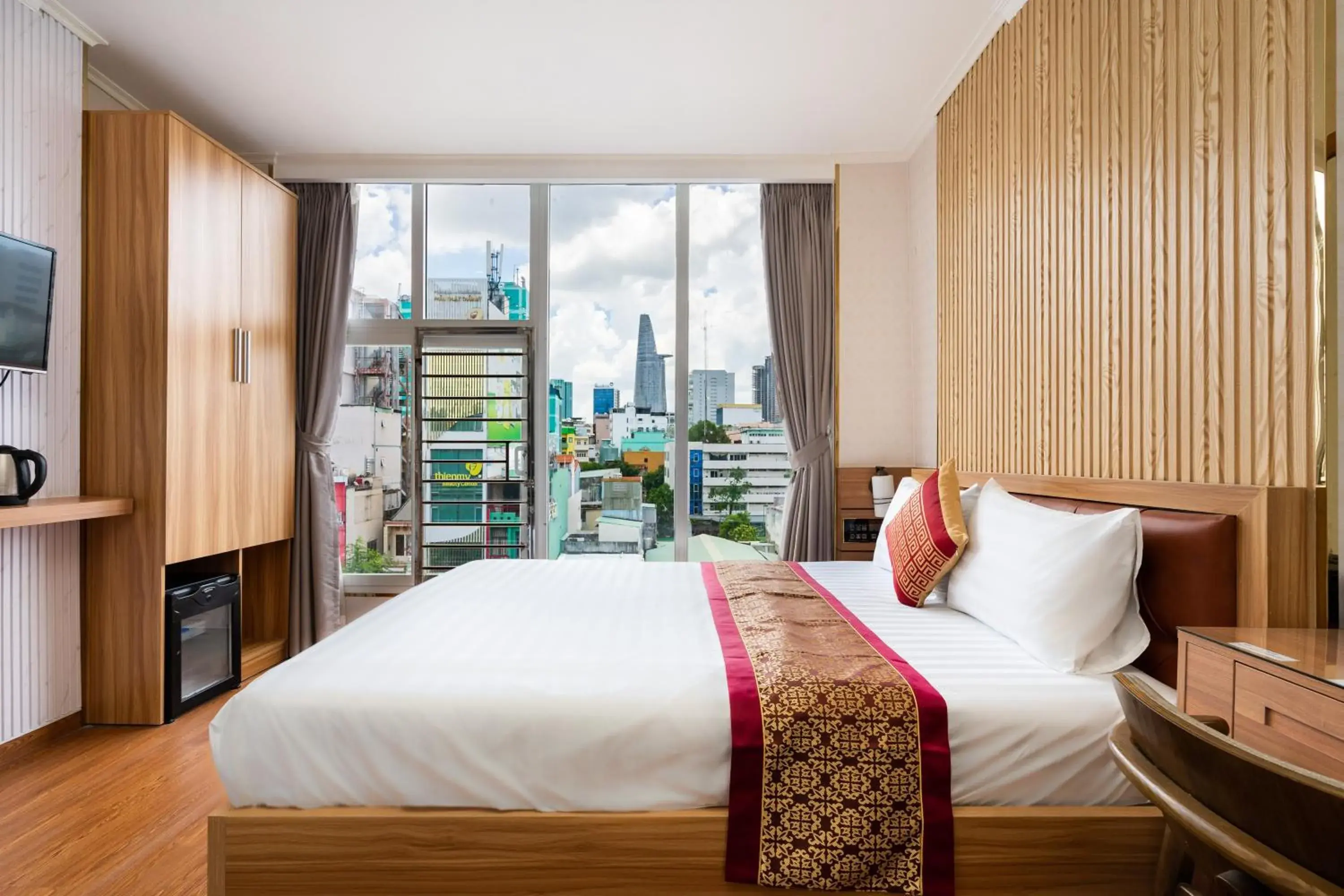 Premium Deluxe Room with City View in Luna Saigon Hotel - Bui Vien Walking Street Premium Deluxe Room with City View in Luna Saigon Hotel - Bui Vien Walking Street