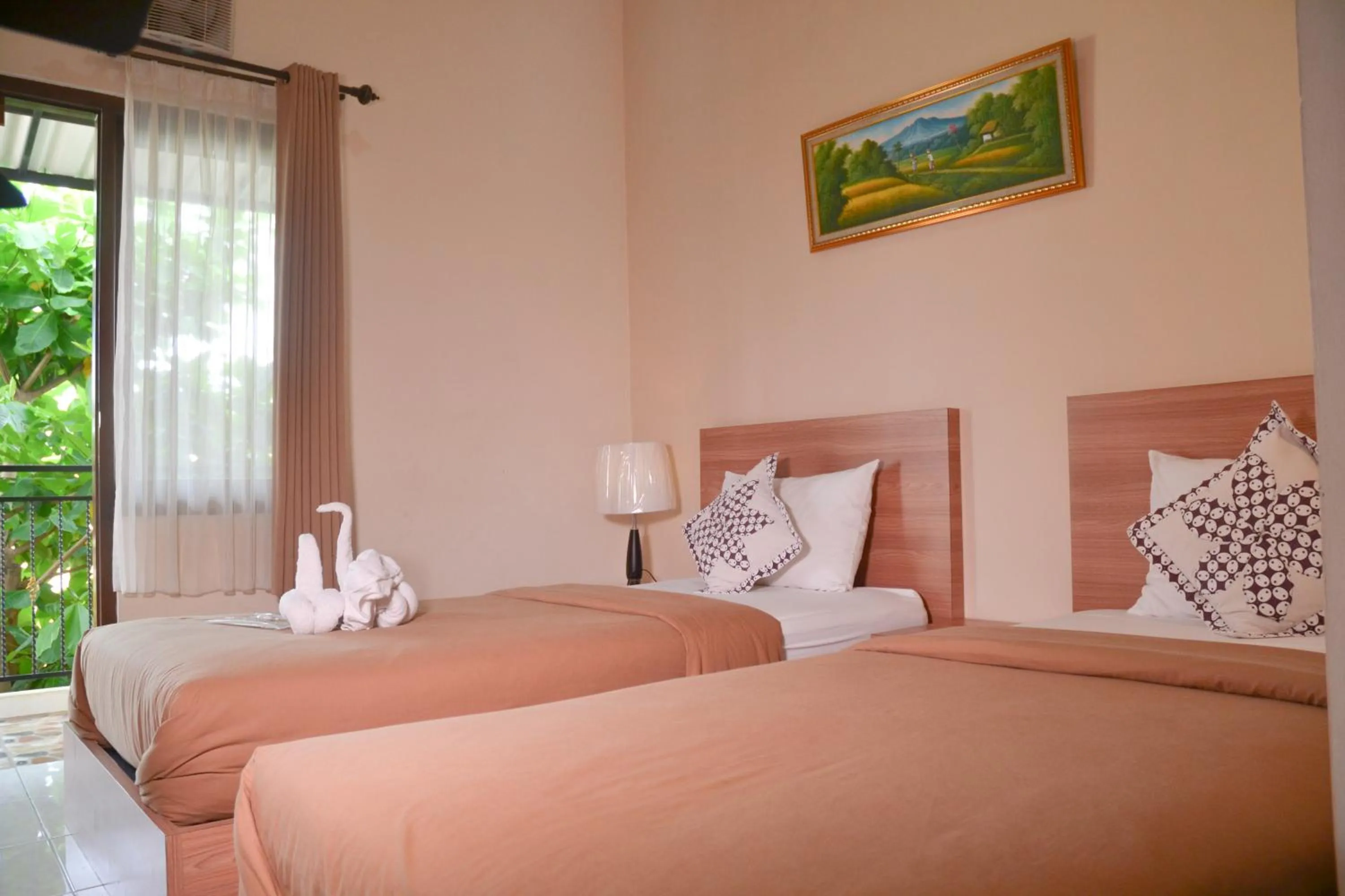 Bed in Roemah Canting Homestay