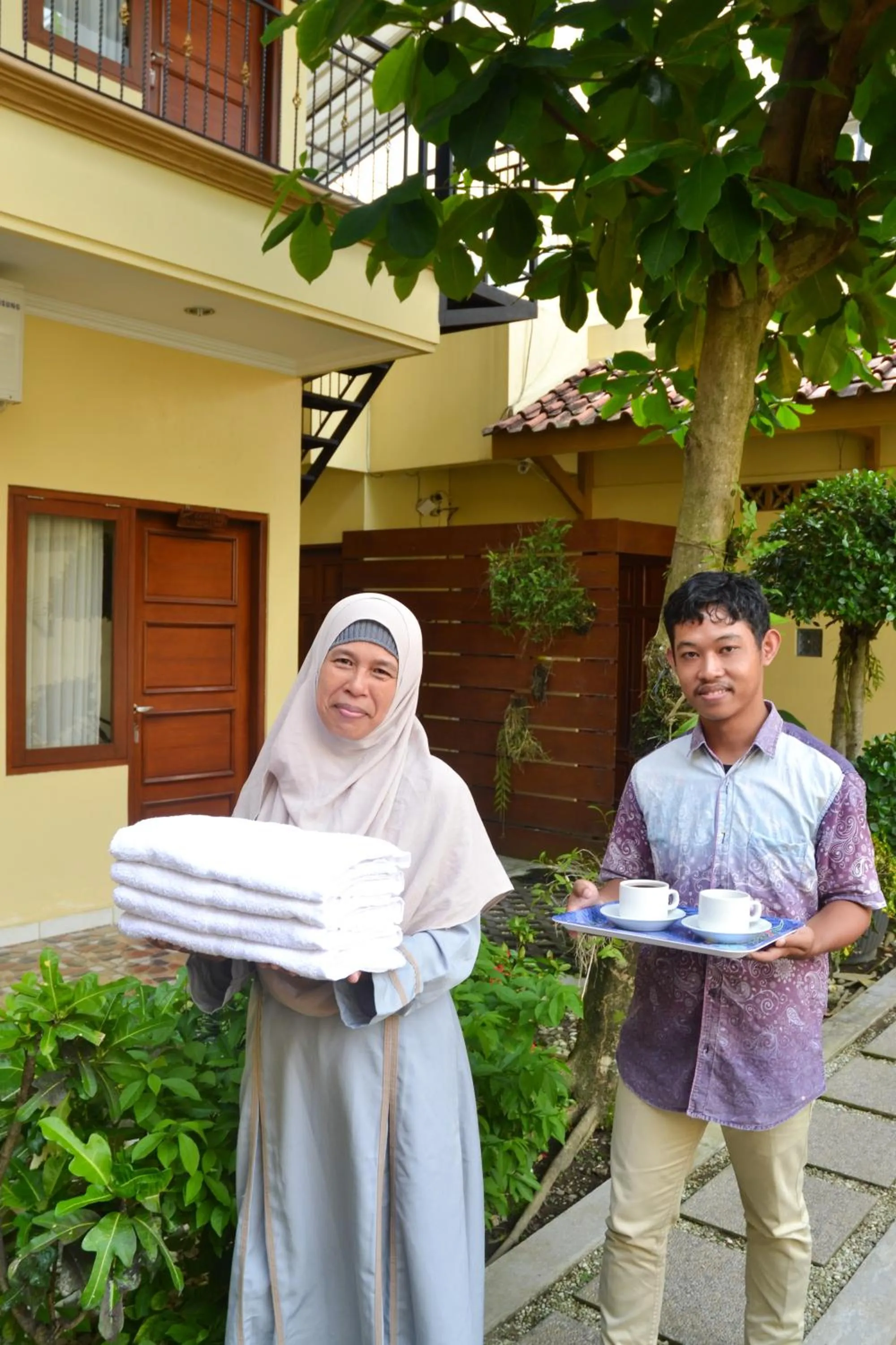 Staff in Roemah Canting Homestay