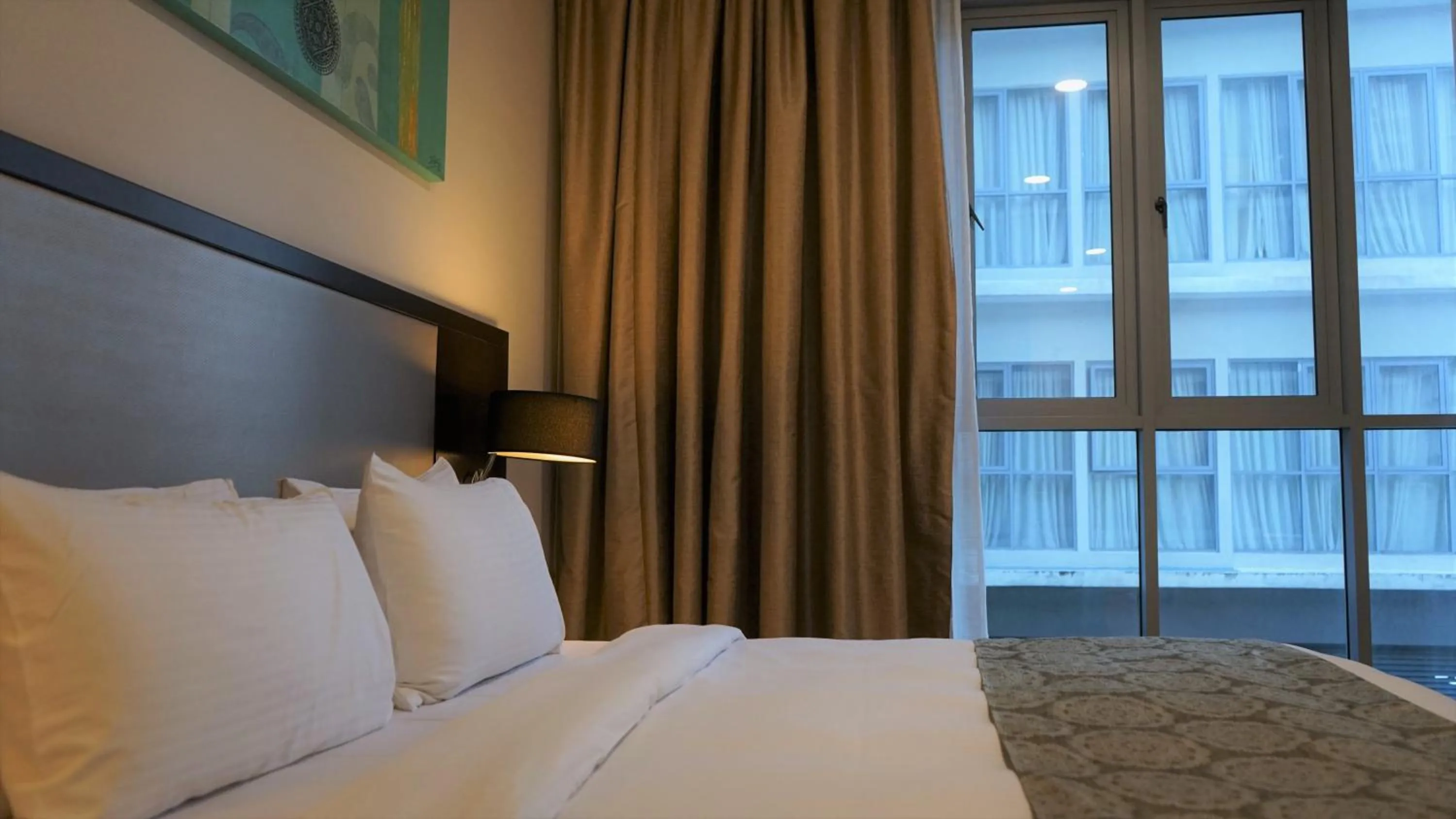 Bed in Marina Puteri Harbour Johor by Perfect Host