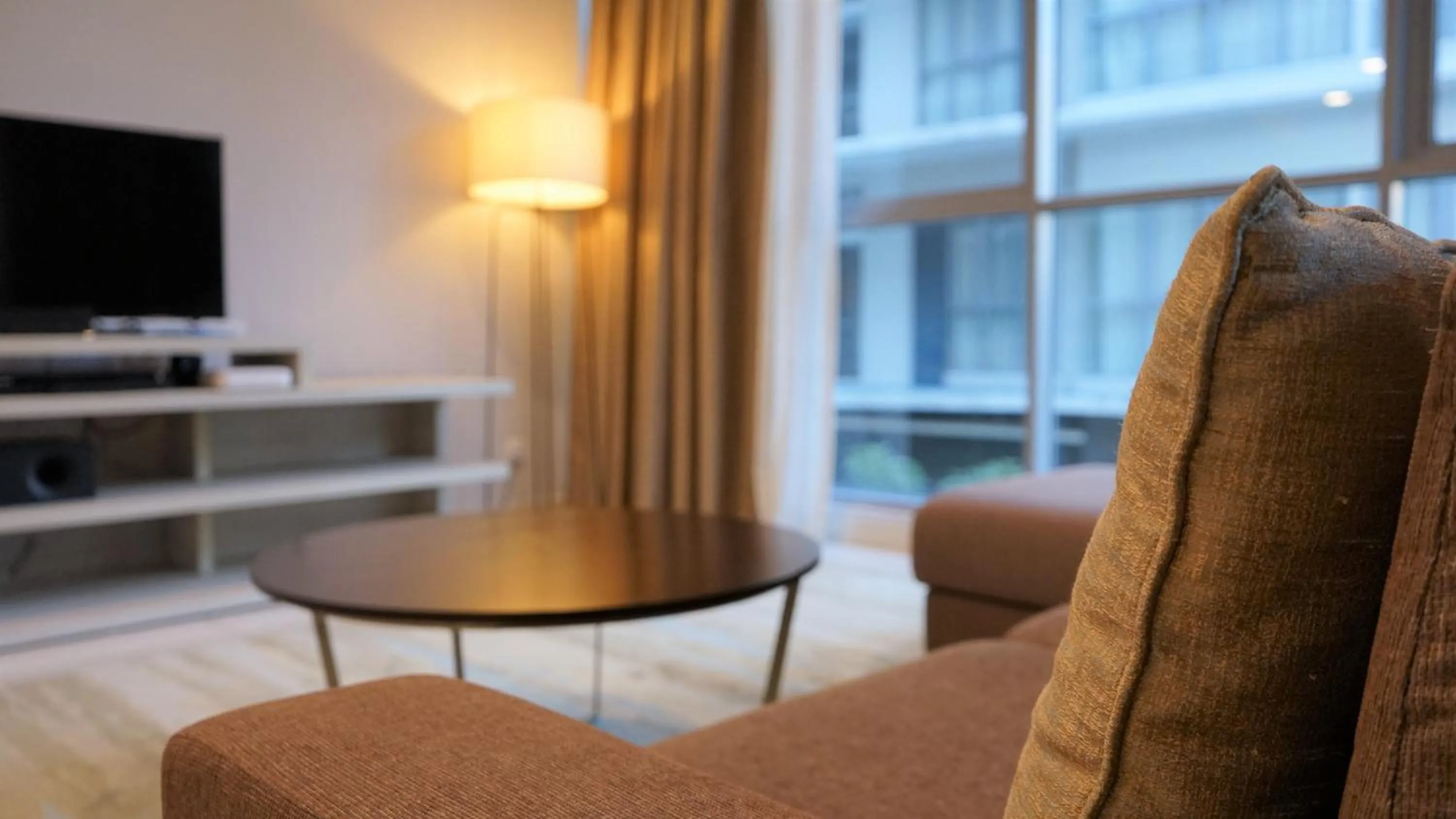 Living room in Marina Puteri Harbour Johor by Perfect Host