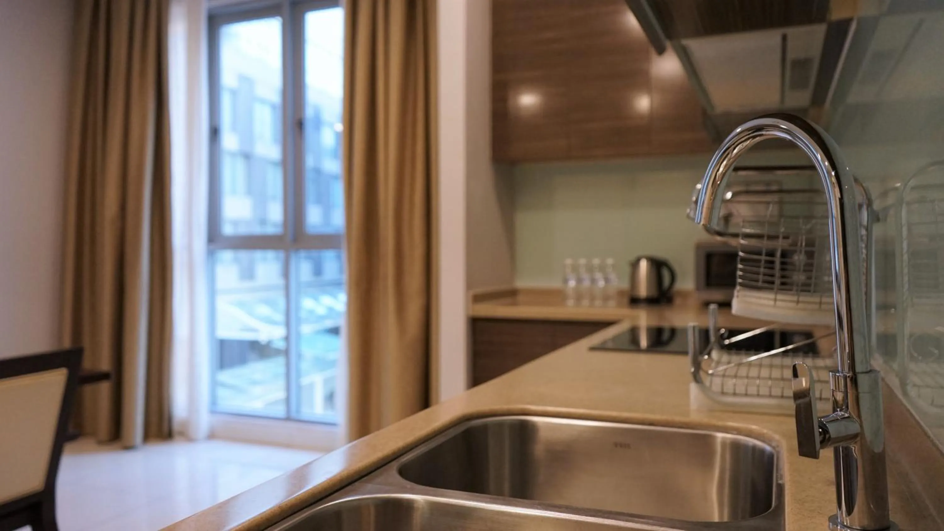 Kitchen or kitchenette in Marina Puteri Harbour Johor by Perfect Host