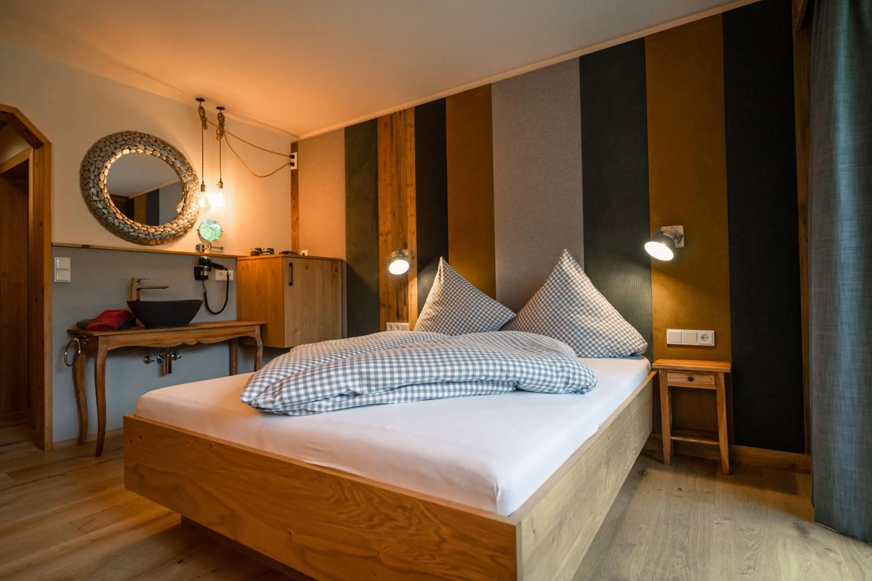 Bed in Hotel Landhaus Tirolerherz