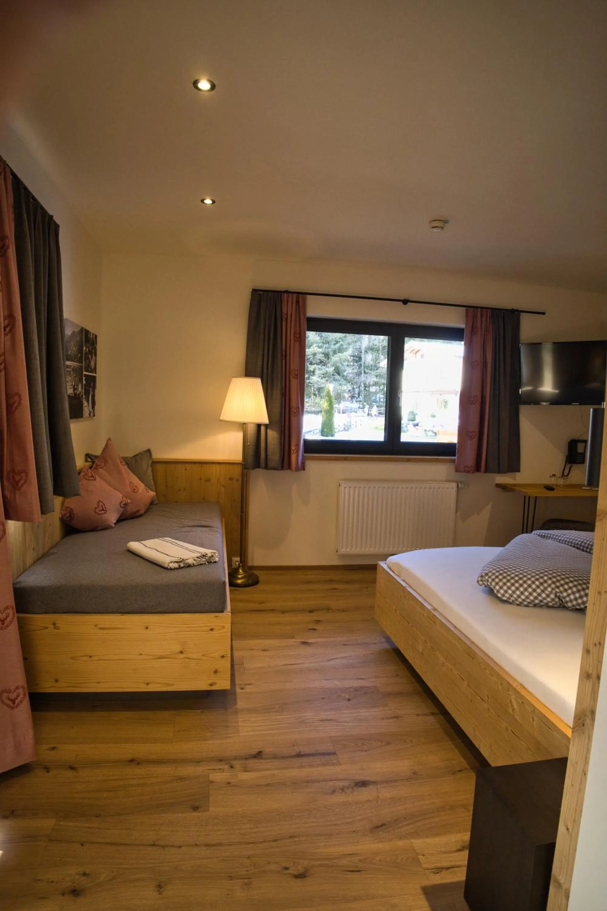 Bed in Hotel Landhaus Tirolerherz