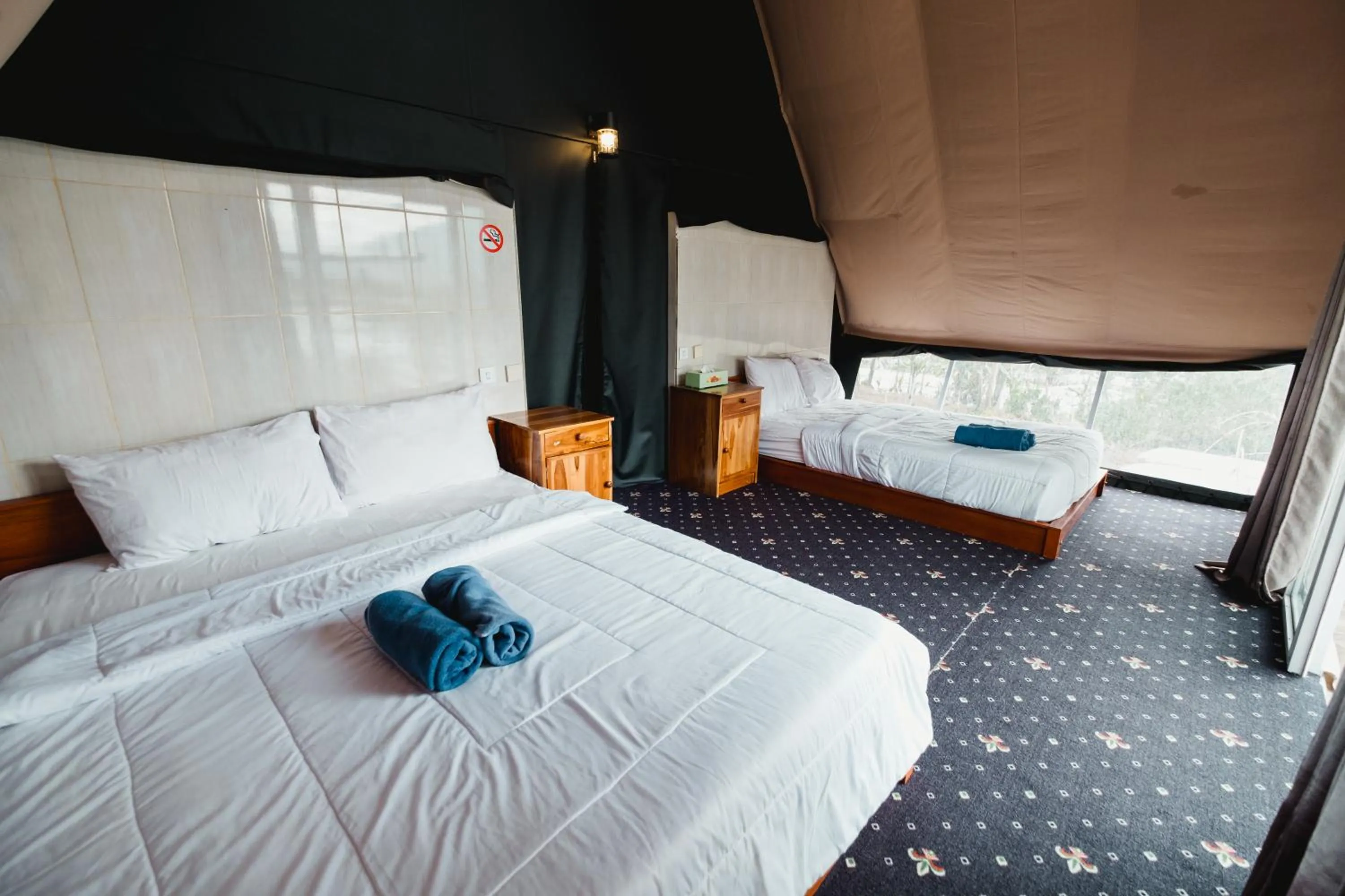 Bed in Popitan Garden Campground & Glamping Bedugul