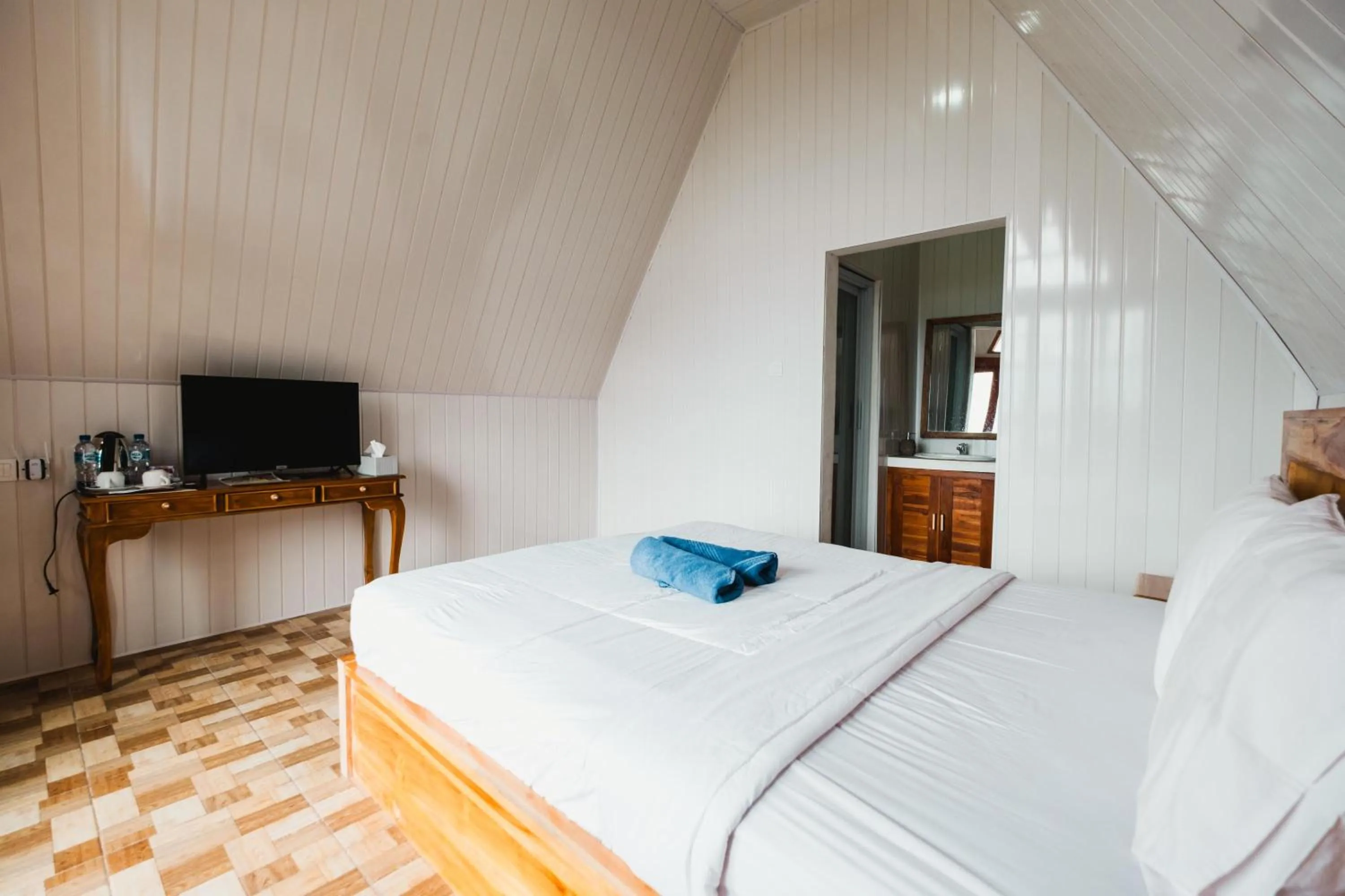 Bed in Popitan Garden Campground & Glamping Bedugul