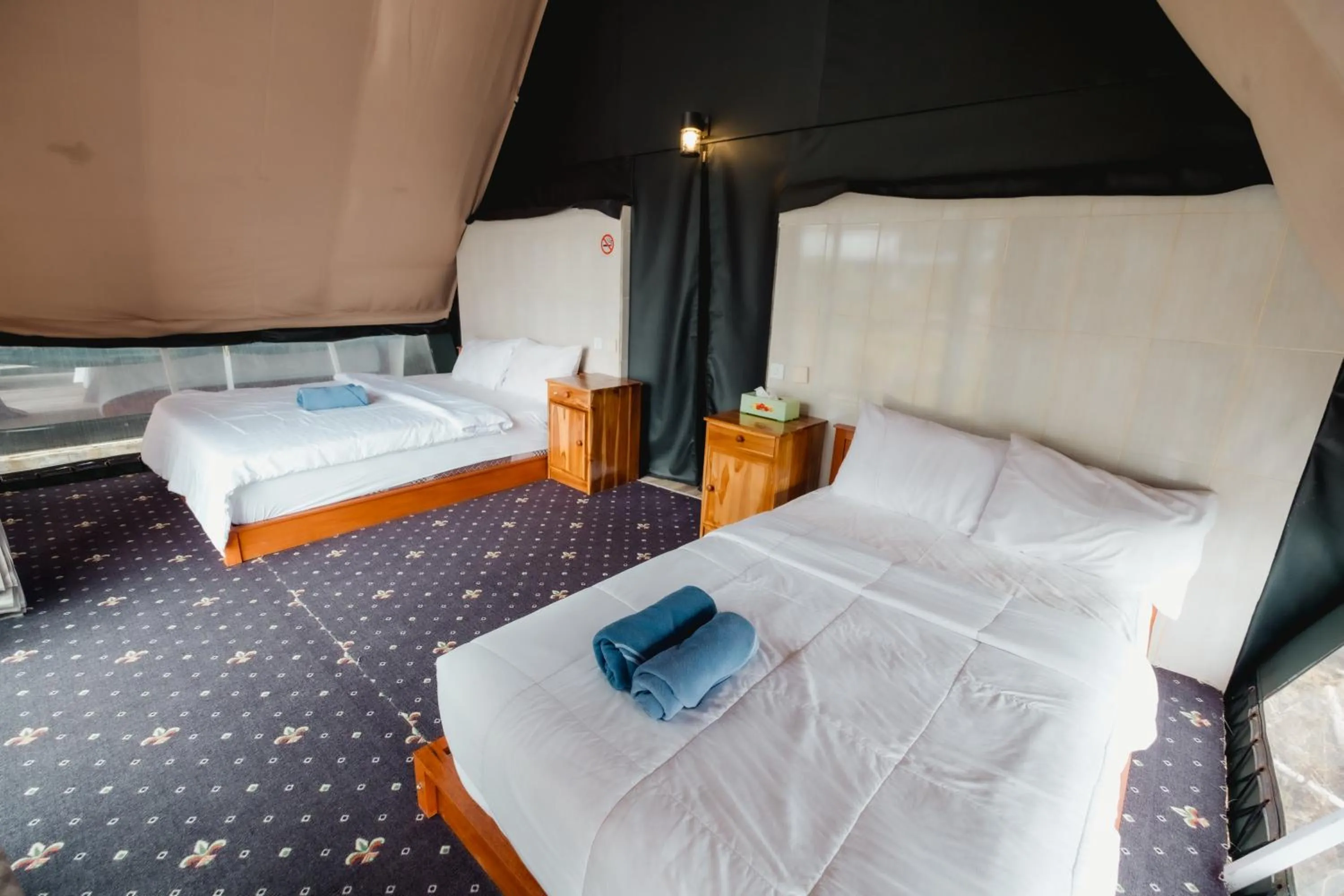 Bed in Popitan Garden Campground & Glamping Bedugul