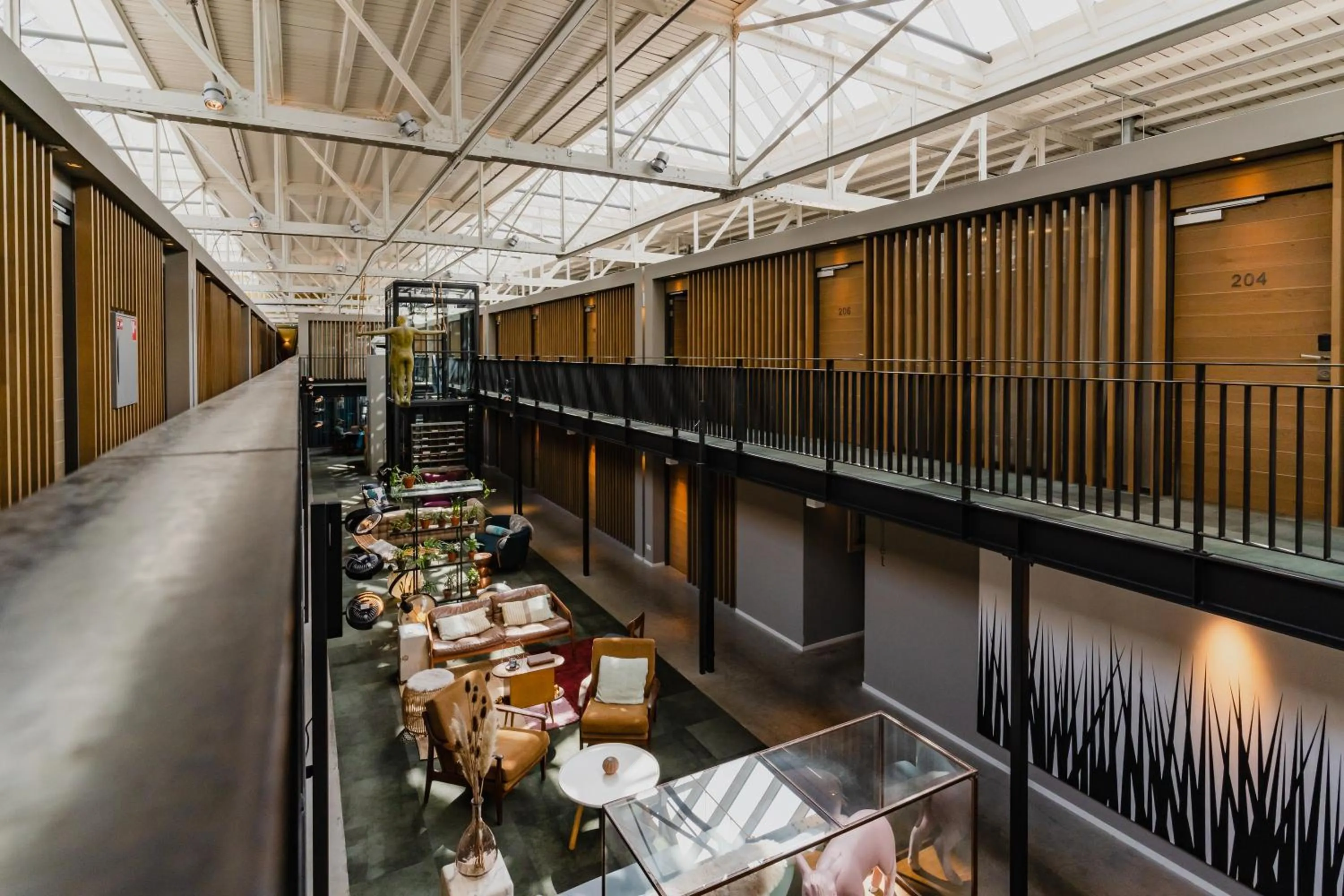 Communal lounge/ TV room in Hotel De Hallen