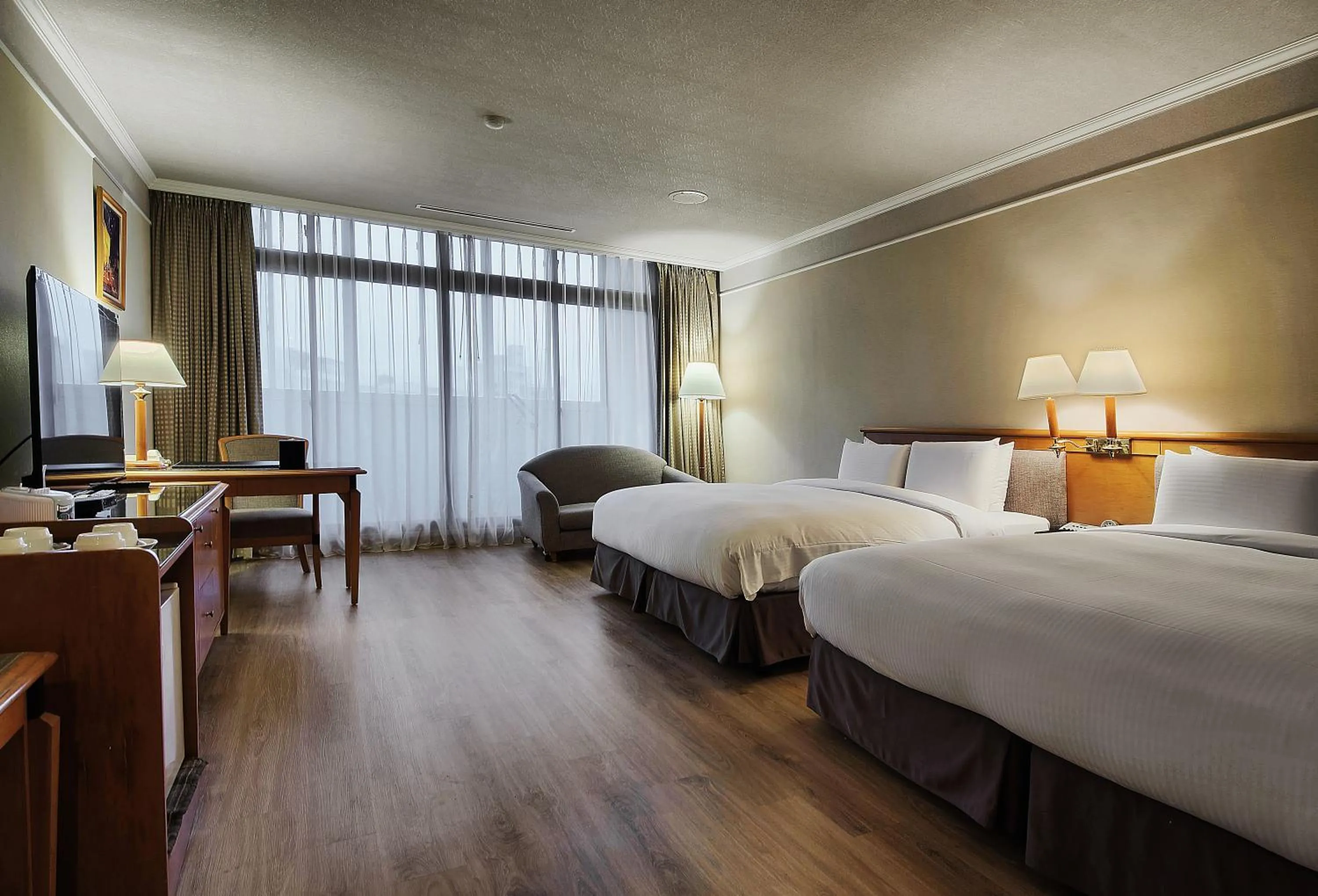 Photo of the whole room, Bed in The Carlton Hotel Hsinchu