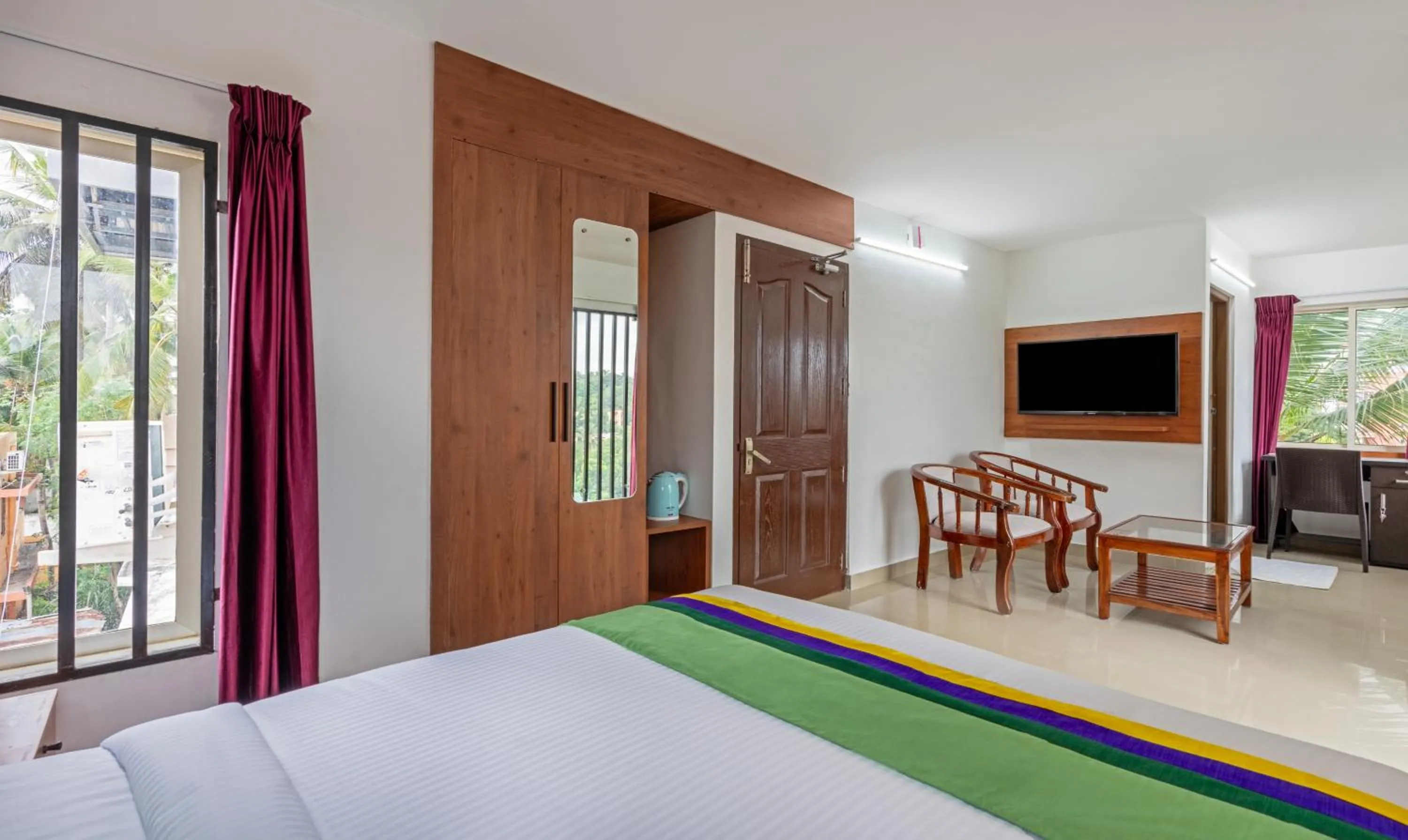 Bed in Treebo JP Residency