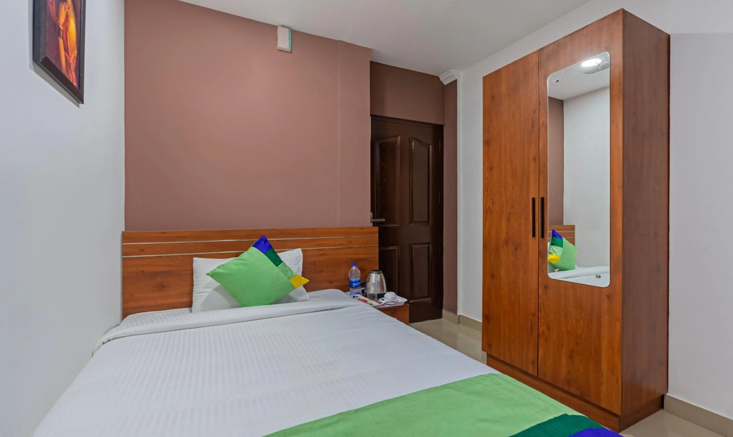 Bed in Treebo JP Residency