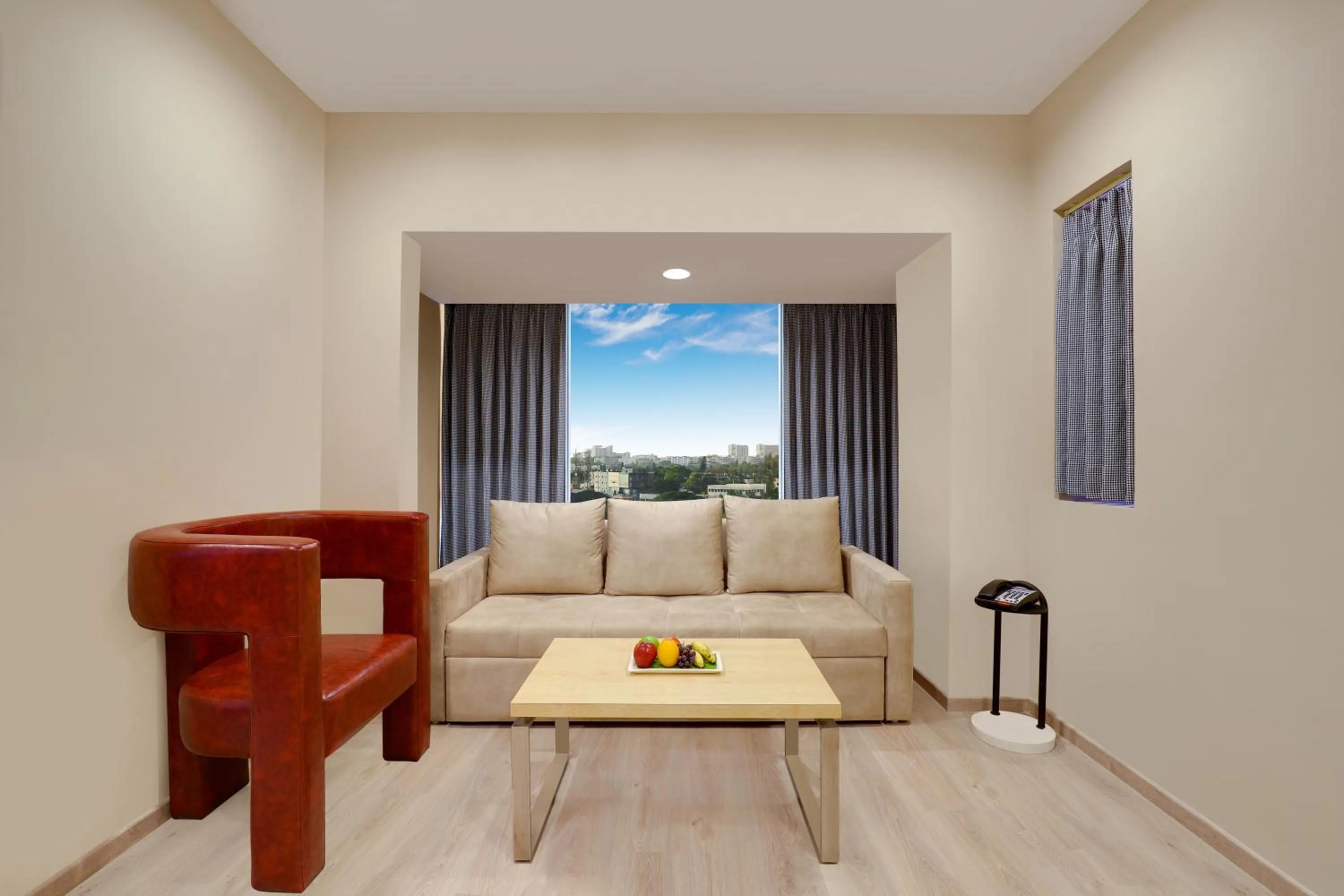 Seating area in Lemon Tree Suites, Whitefield, Bengaluru