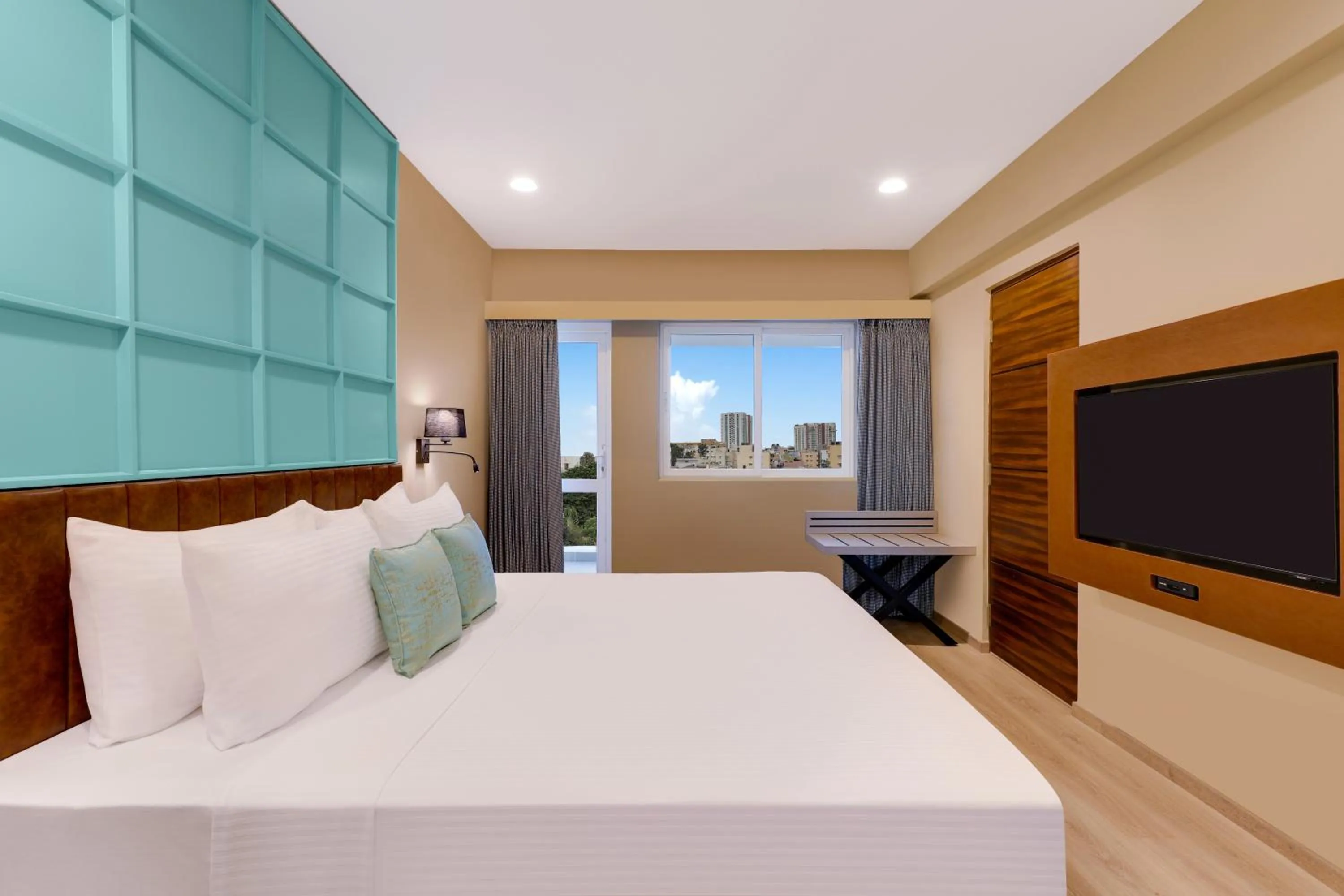 Photo of the whole room, Bed in Lemon Tree Suites, Whitefield, Bengaluru